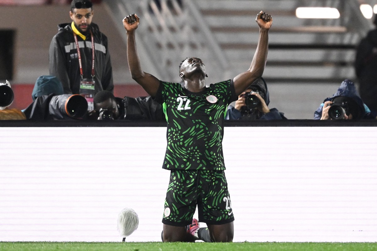 Nigeria's forward #22 Akor Adams celebrates scoring the team's fourth goal during the Africa Cup of Nations (CAN) round of 16 football match between Nigeria and Mozambique
