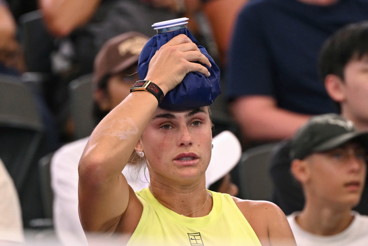 Belarus's Aryna Sabalenka places an ice pack on her head during a match.