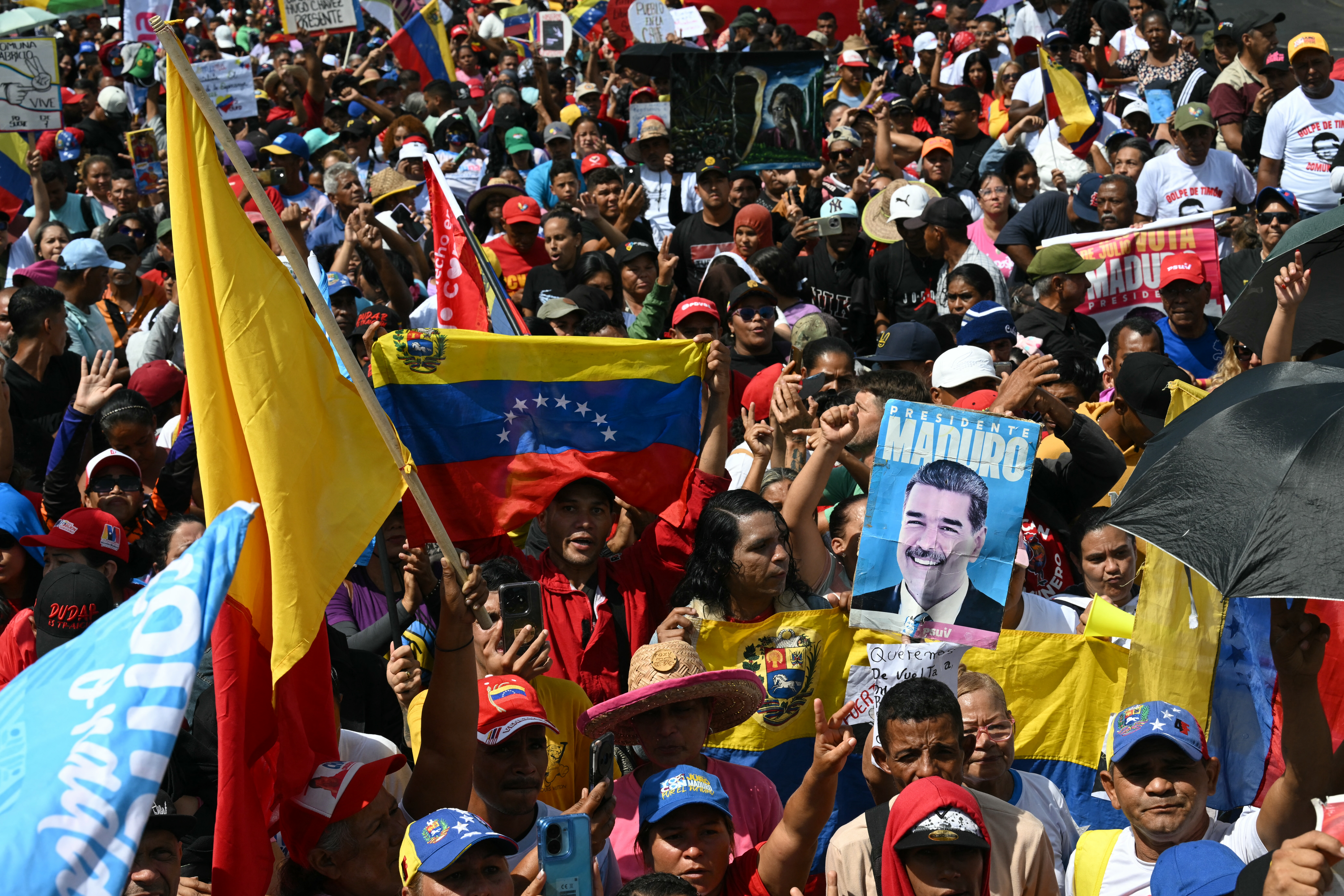 Demonstrators attend a rally in support of ousted President Nicolas Maduro in Caracas