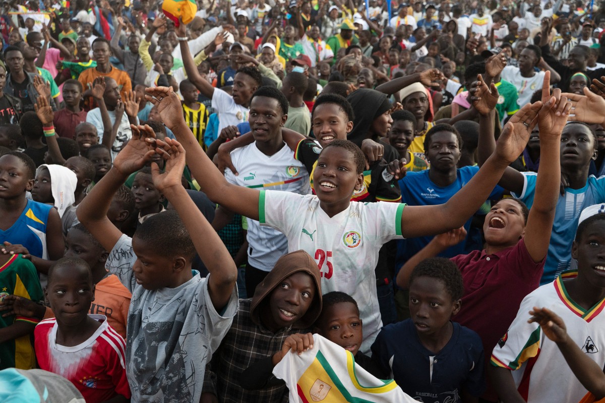Morocco and Senegal celebrate advancing to the AFCON final showdown