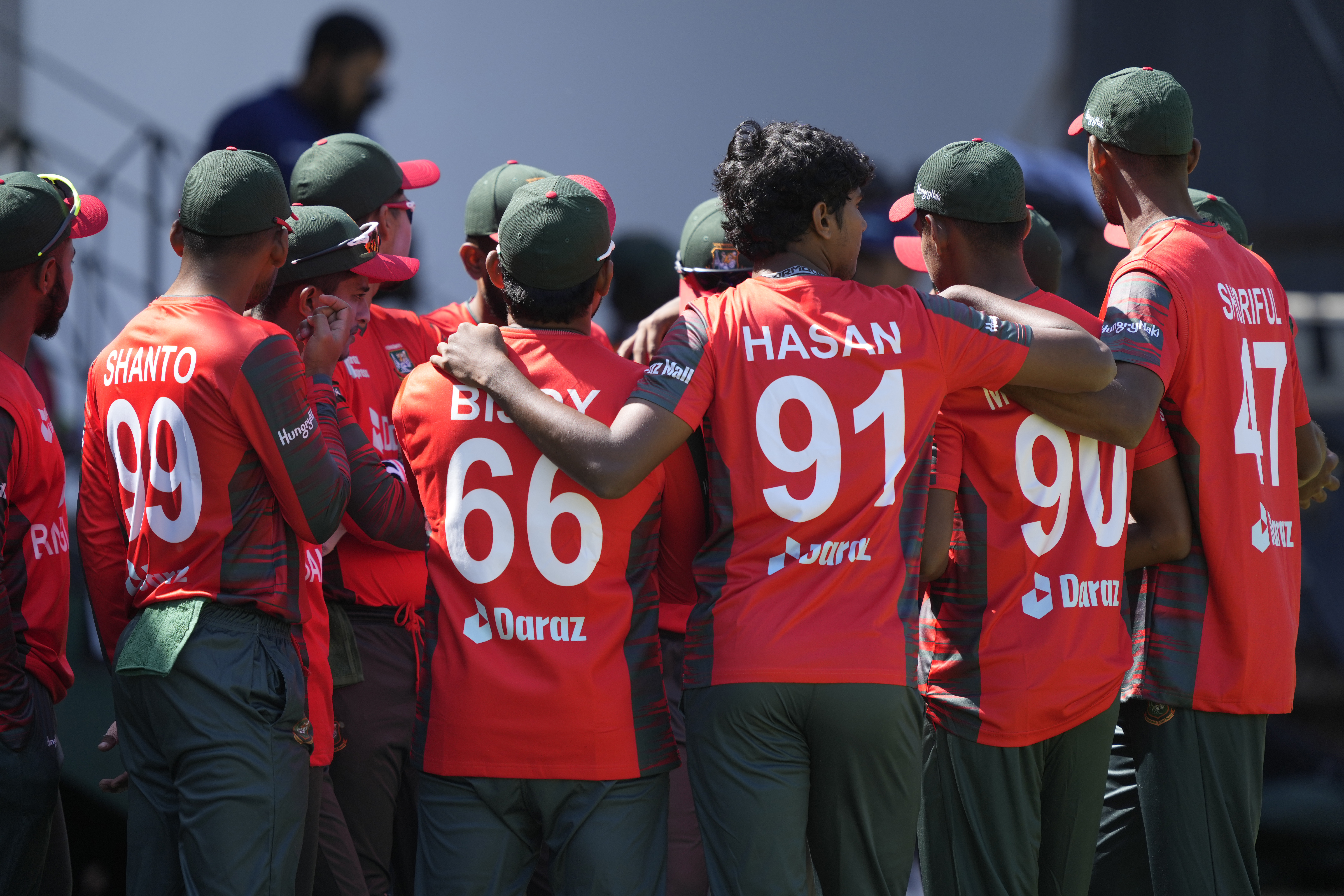 Bangladesh players huddle together on the final day of the T20 match between Zimbabwe and Bangladesh at Harare Sports Club, in Harare, Zimbabwe, Sunday, July 31, 2022. (AP Photo/Tsvangirayi Mukwazhi)