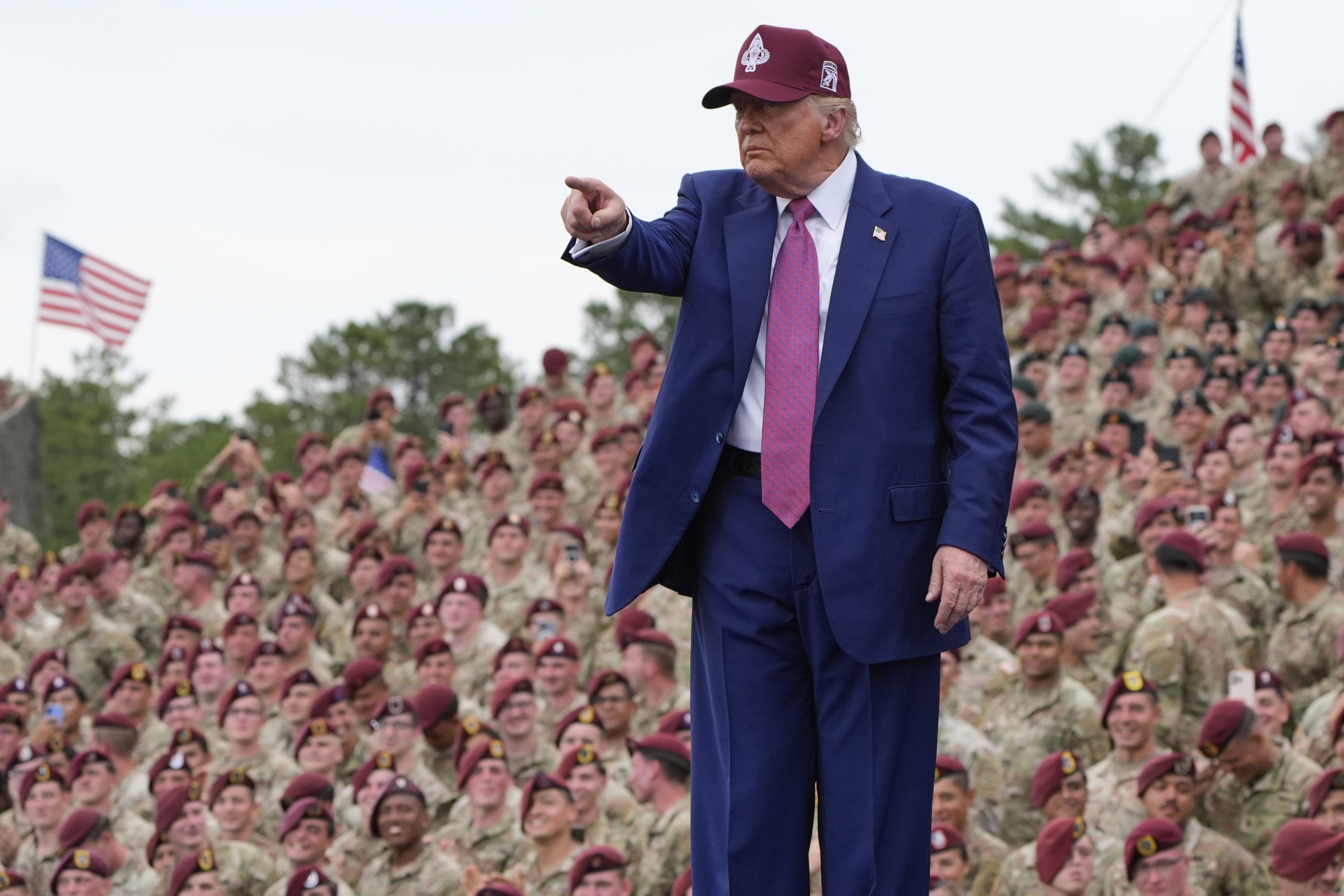 Trump points as he visits Fort Bragg