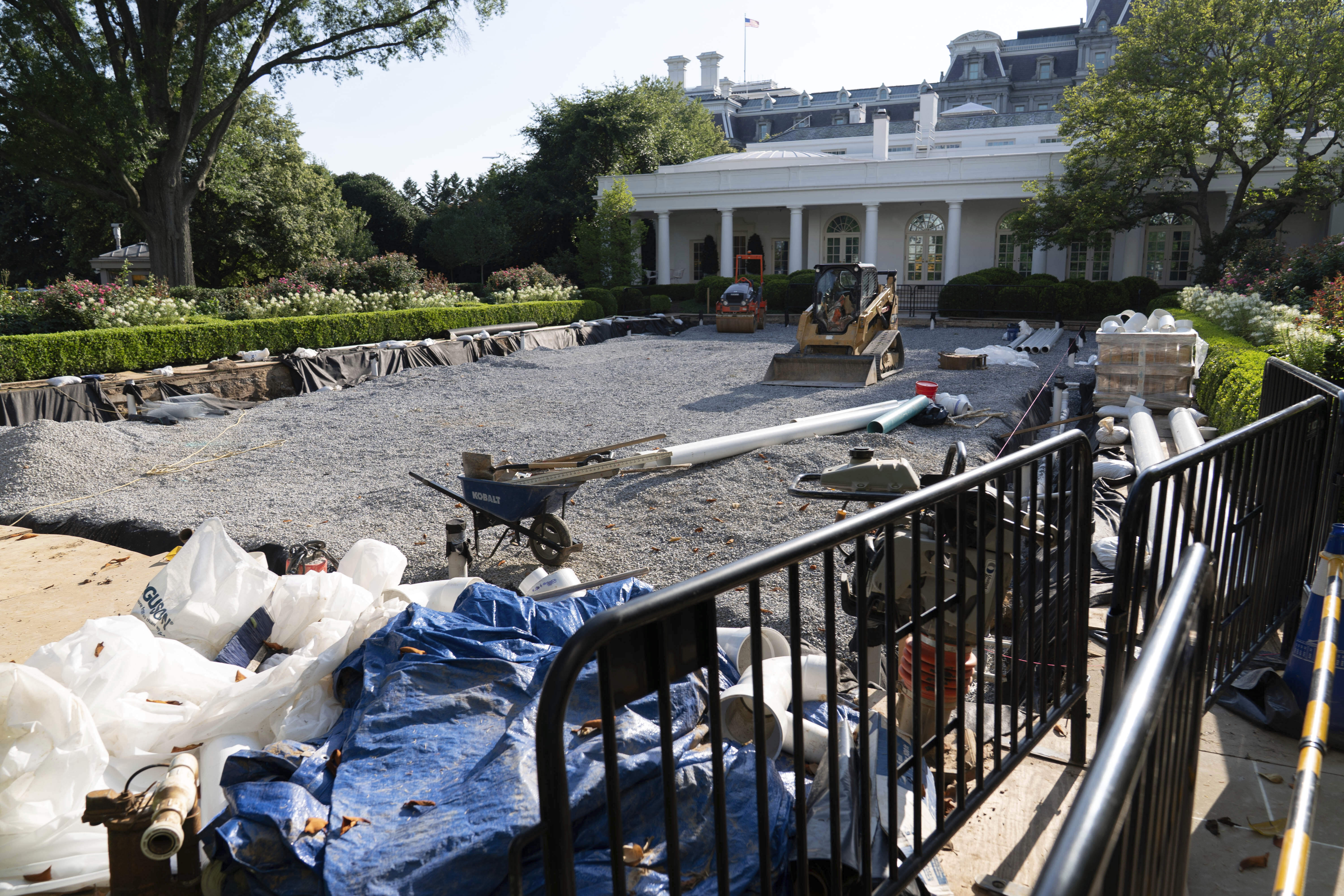 A view of the paved over Rose Garden at the White House, under construction