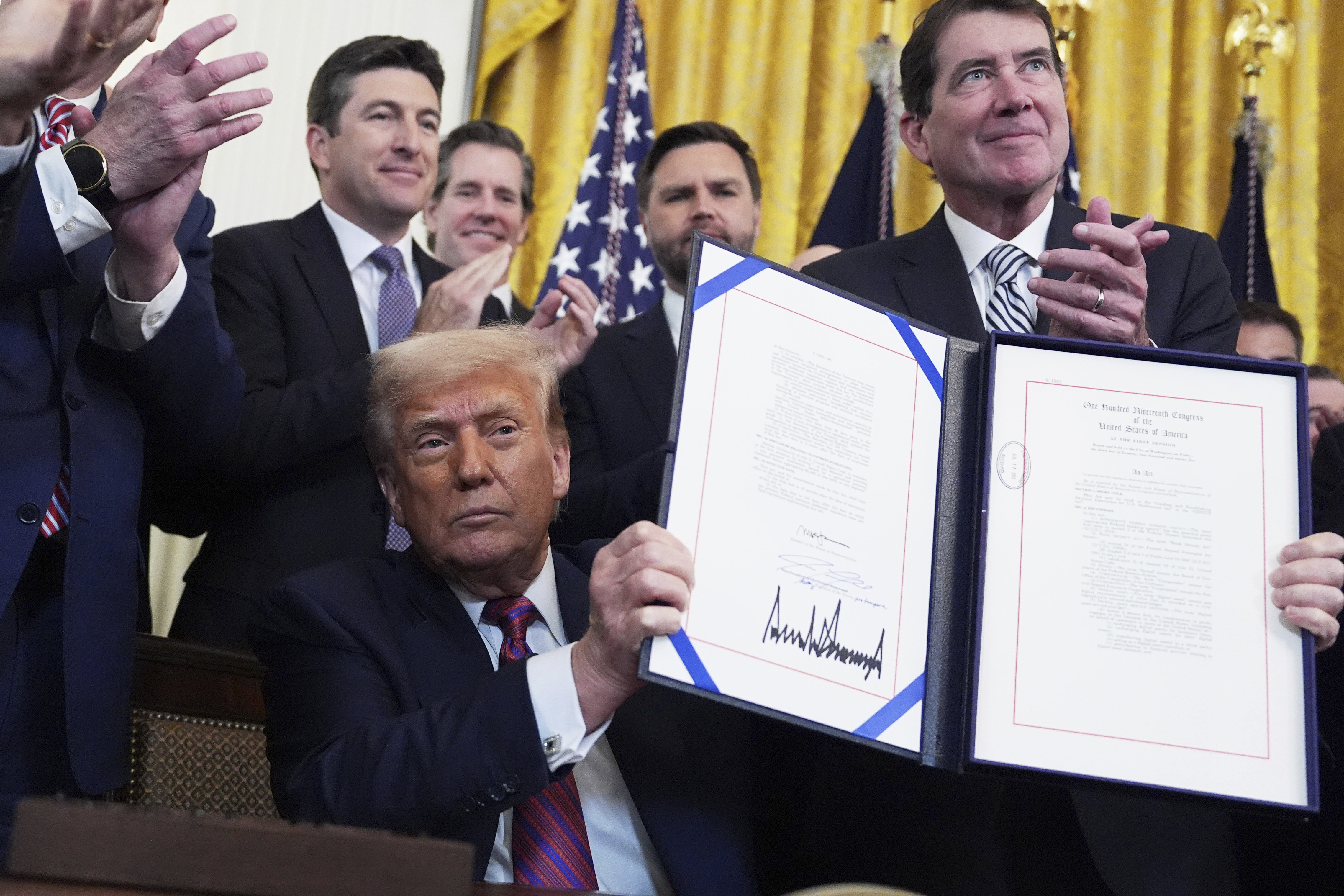 Trump holds up an executive order
