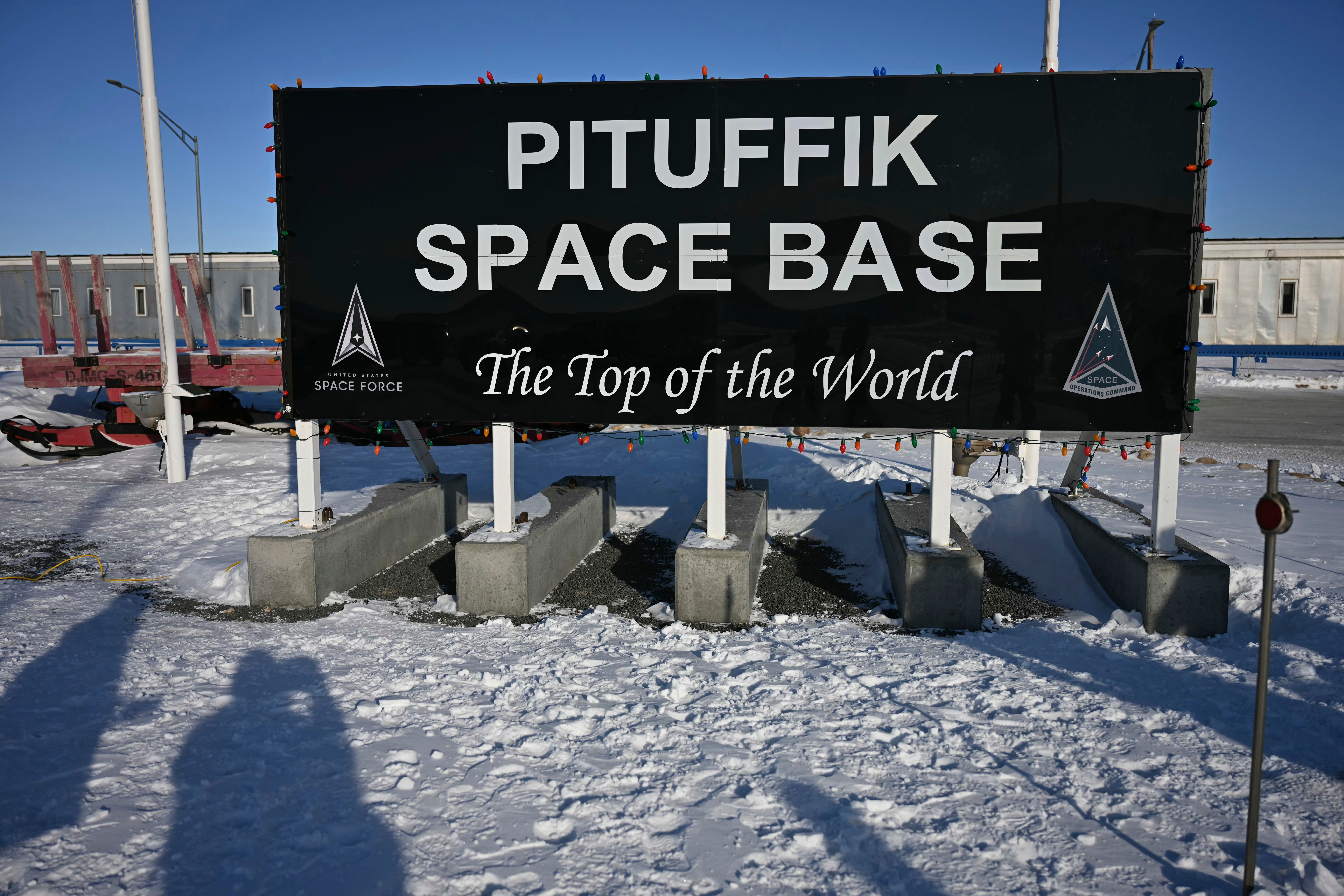 A sign is pictured at the entrance of Pituffik Space Base.