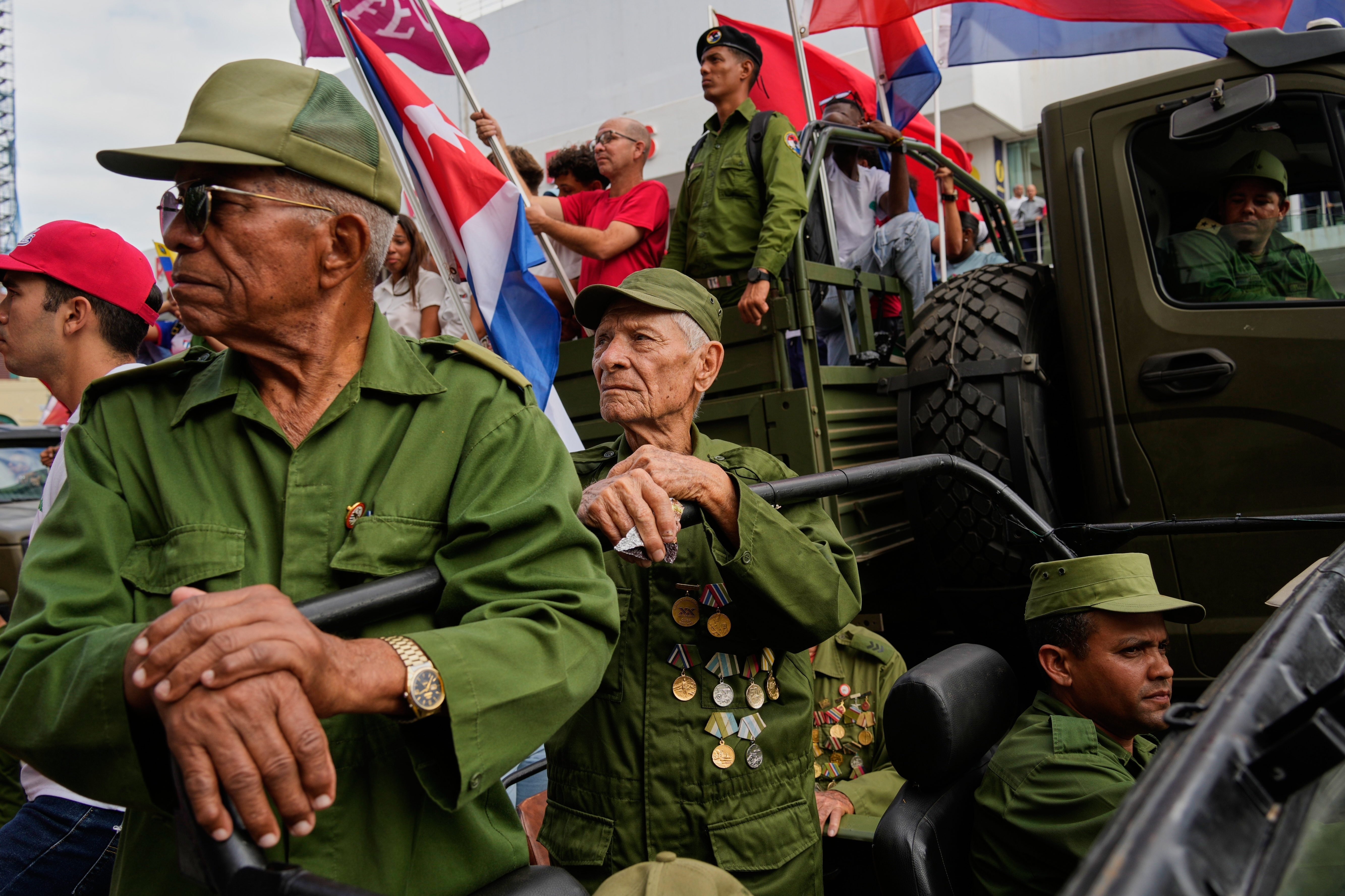 Veterans of the 1959 Cuban Revolution take part in a parade during the anniversary of Fidel Castro's arrival to the capital as the head of the rebel army, in Havana