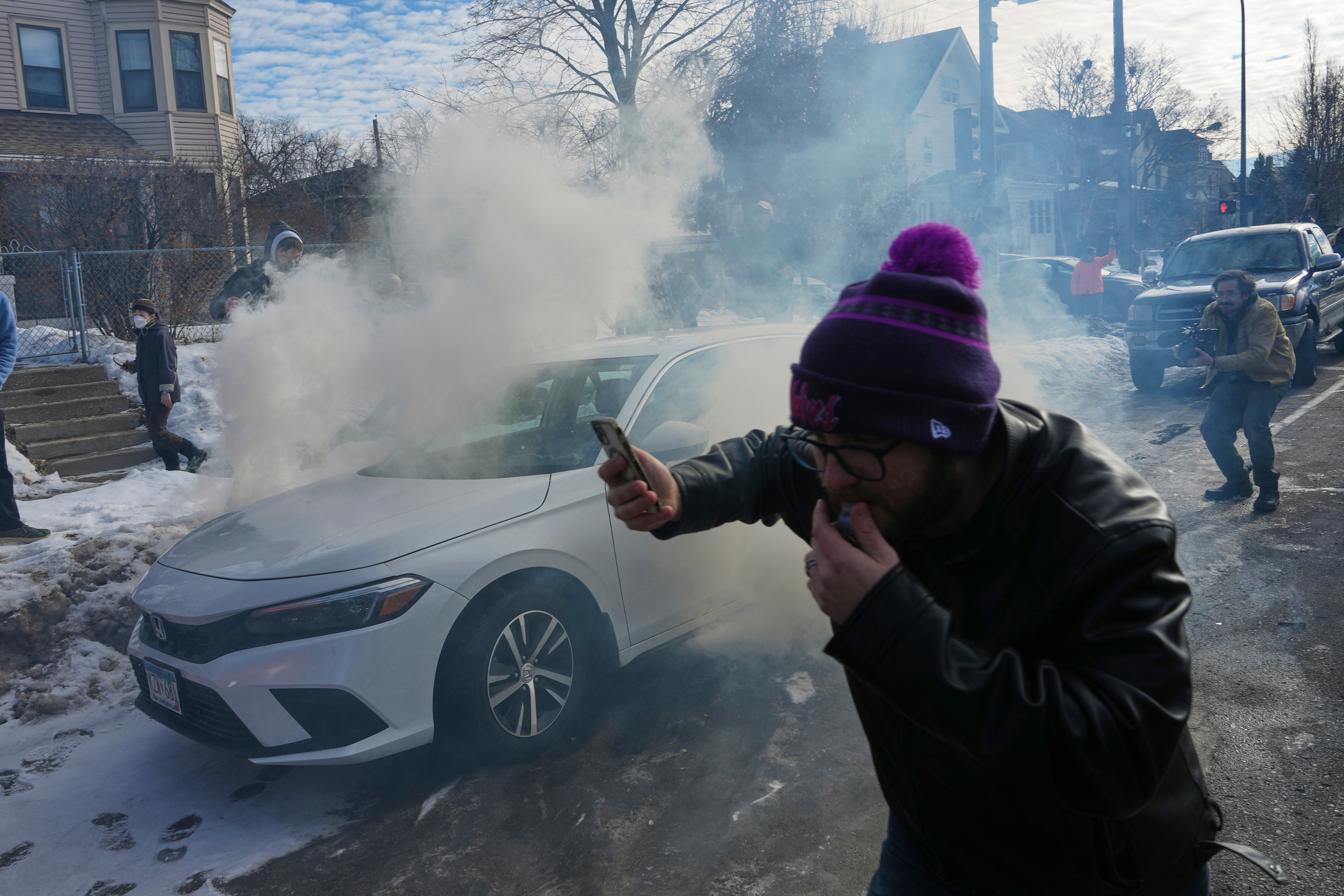 Tensions flare in Minnesota as protesters and federal agents square off