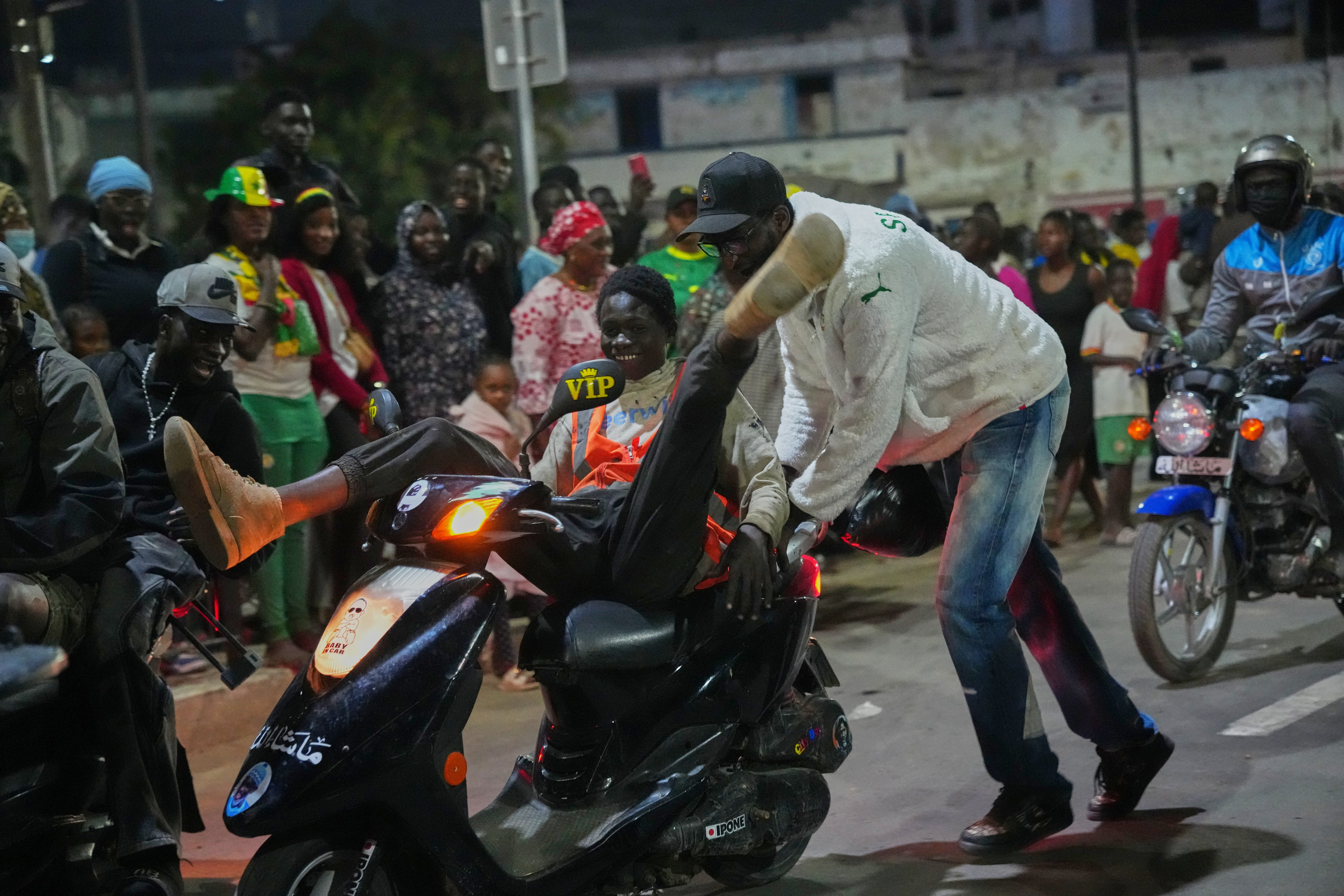 Morocco and Senegal celebrate advancing to the AFCON final showdown