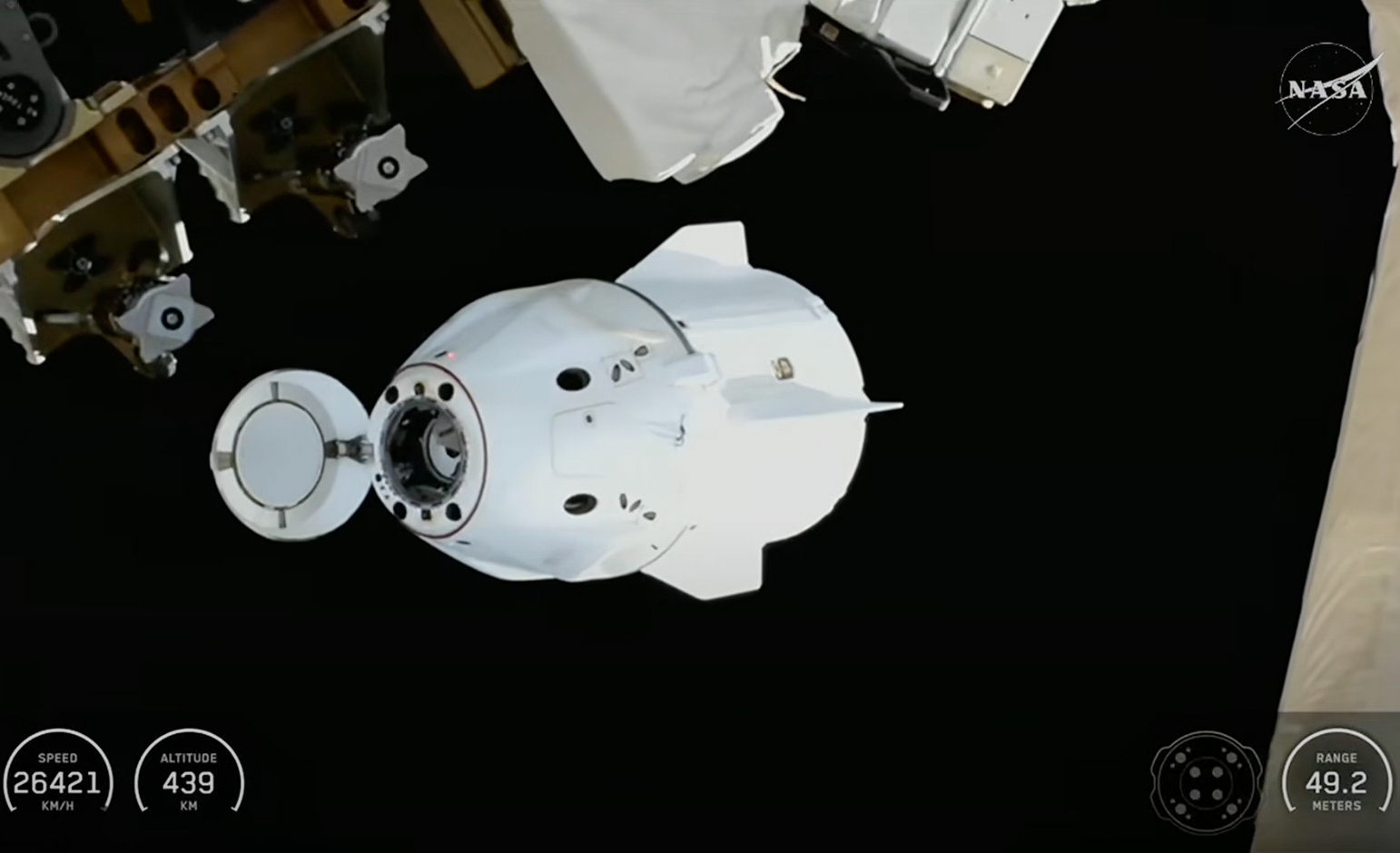 This screengrab from video provided by NASA TV shows the SpaceX Dragon departing from the International Space Station shortly after undocking with four NASA Crew-11 members inside on Wednesday, Jan. 14, 2026. (NASA via AP)
