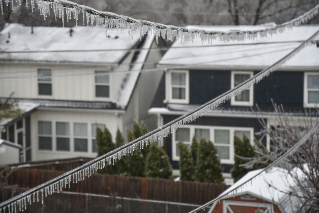 Icicles form on power lines during a winter storm in Nashville, Tenn