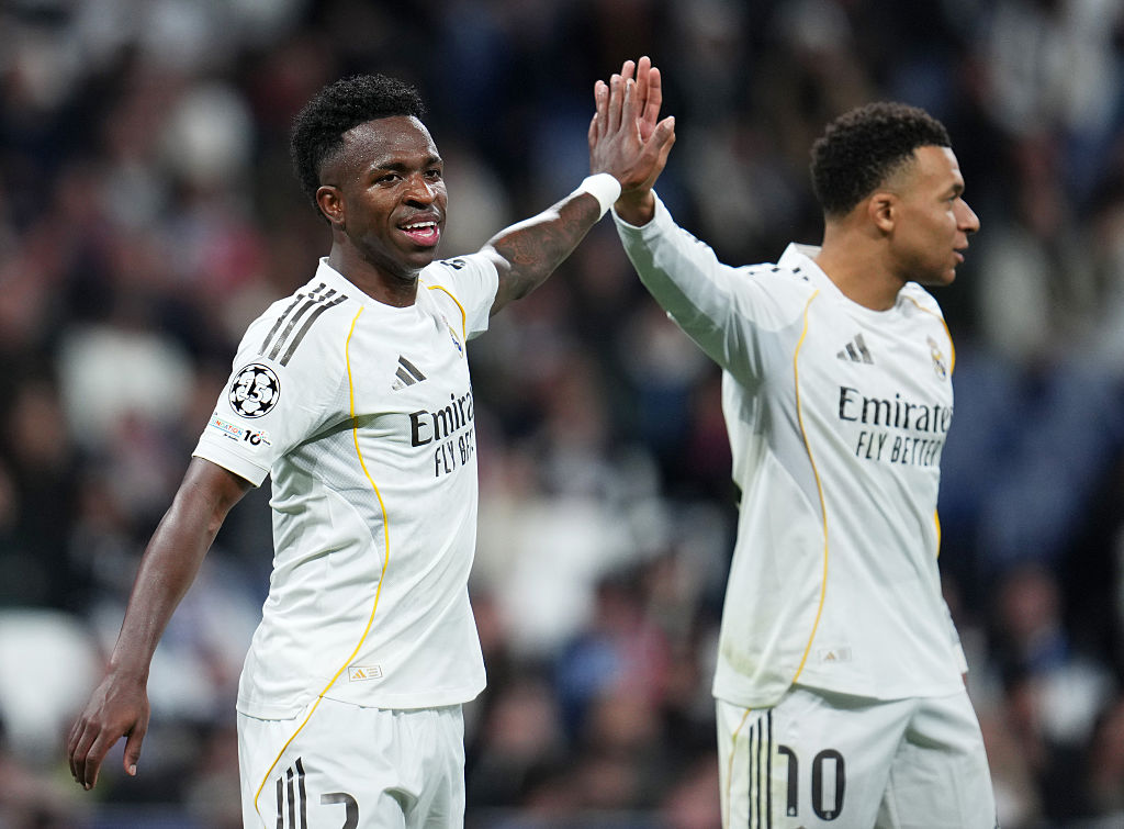 Vinicius Junior of Real Madrid reacts with Kylian Mbappe during the UEFA Champions League 2025/26 League Phase MD7 match between Real Madrid C.F. and AS Monaco