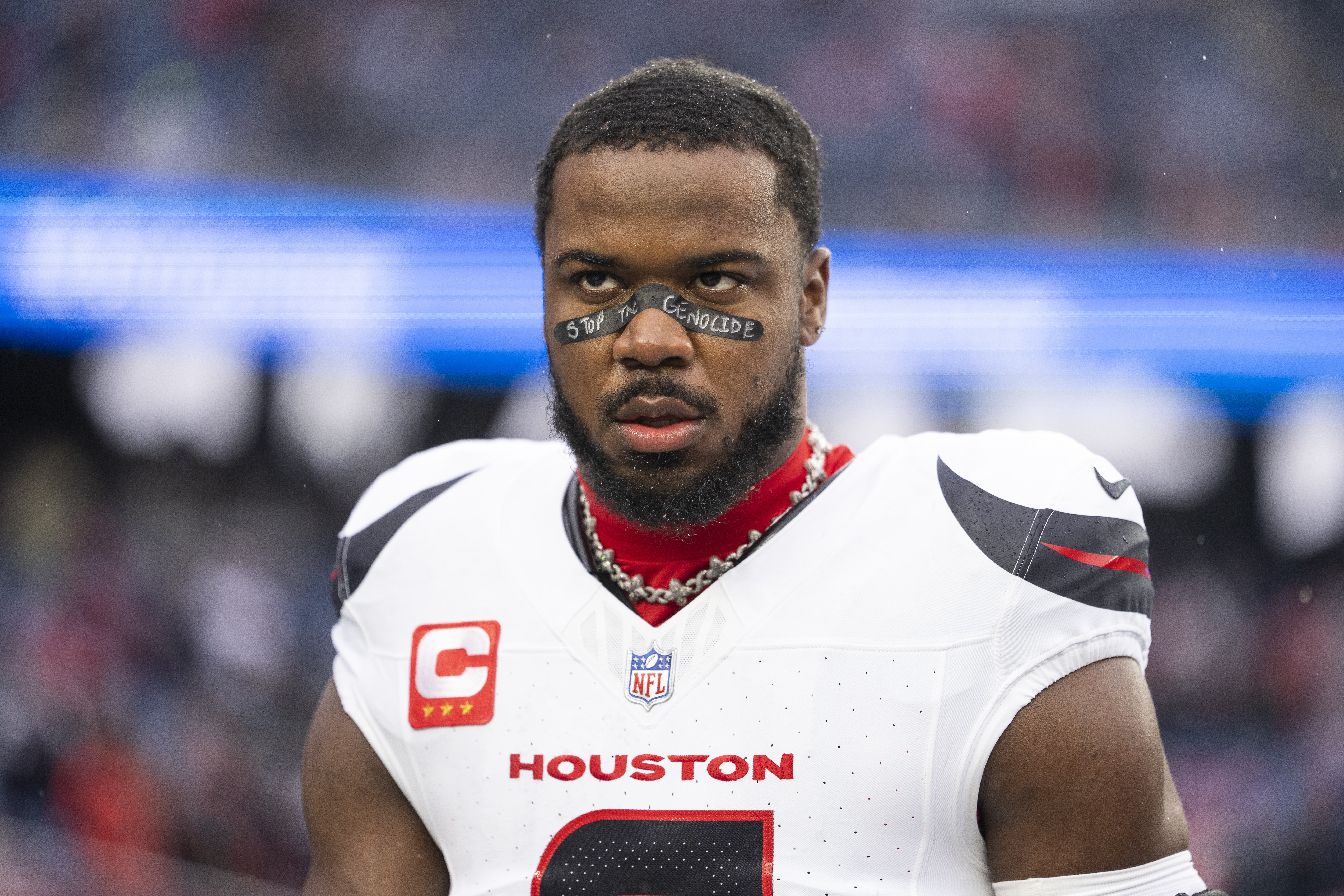 Azeez Al-Shaair #0 of the Houston Texans looks on prior to an NFC Divisional Playoff game against the New England Patriots at Gillette Stadium