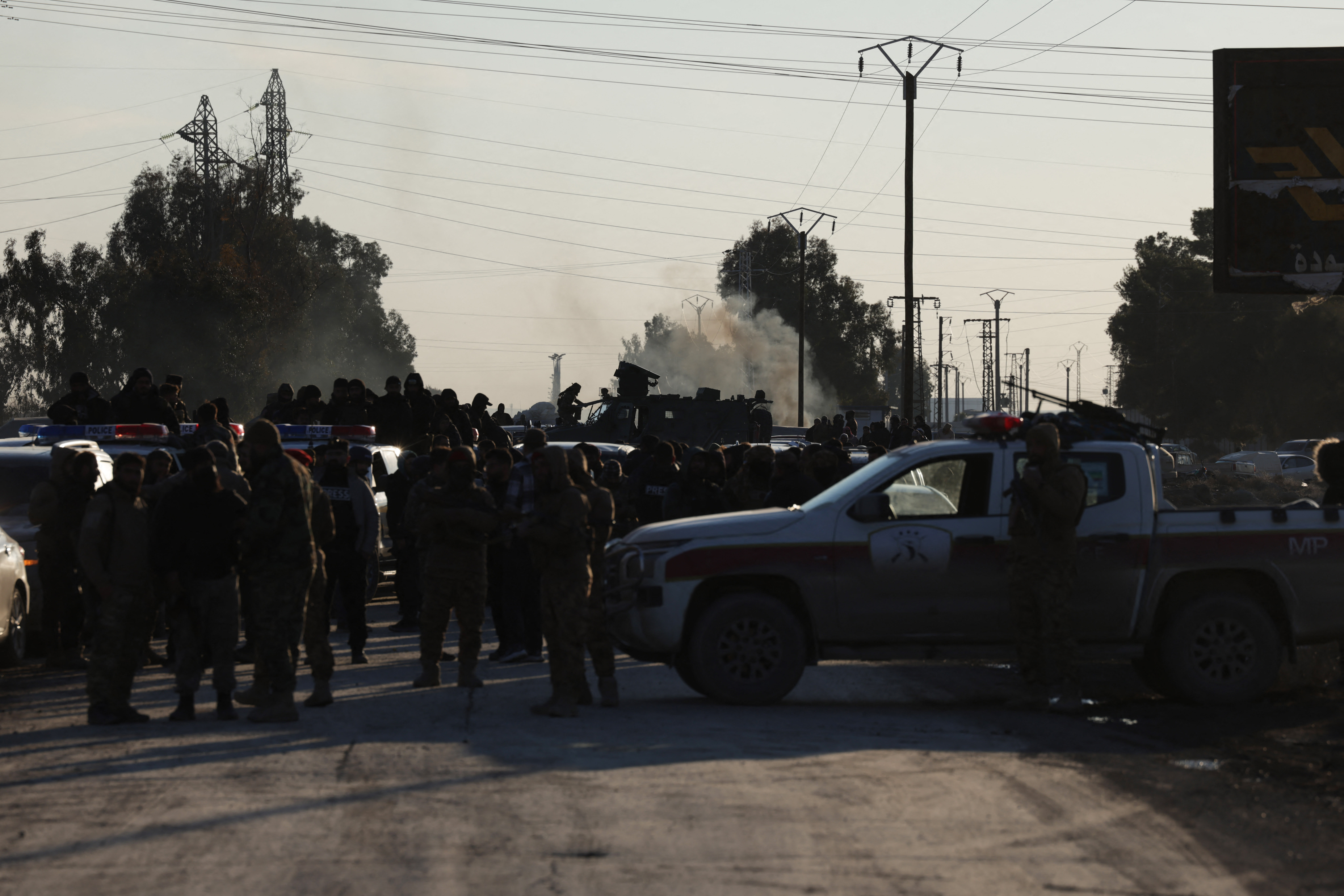 Syrian government forces take possession of an SDF military base as they enter the city of Raqqa