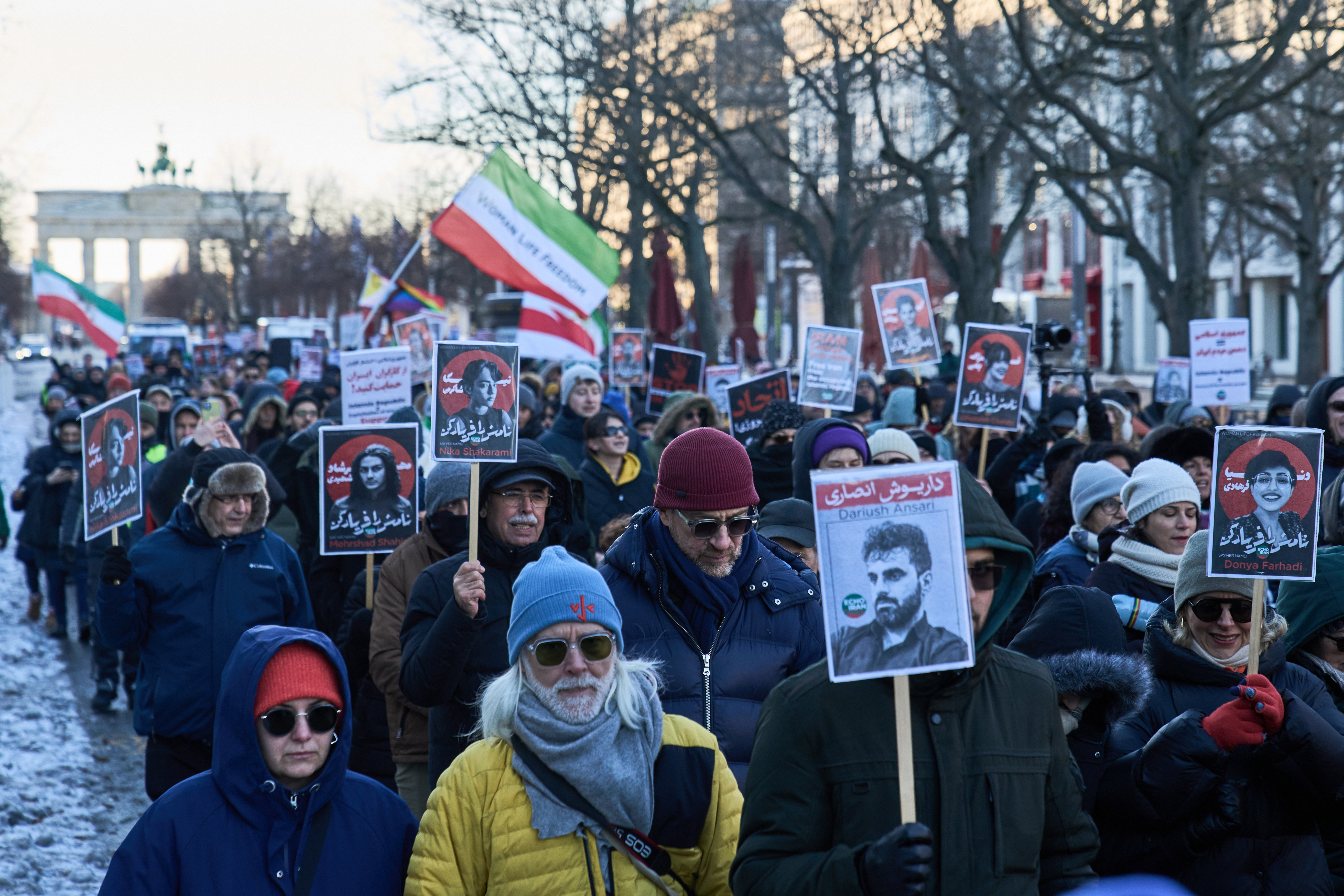 Protesters participate in a demonstration in front of the Brandenburg Gate in Berlin, Germany, in support of the nationwide mass protests in Iran against the government, Sunday, Jan. 11, 2026. (AP Photo/Ebrahim Noroozi)
