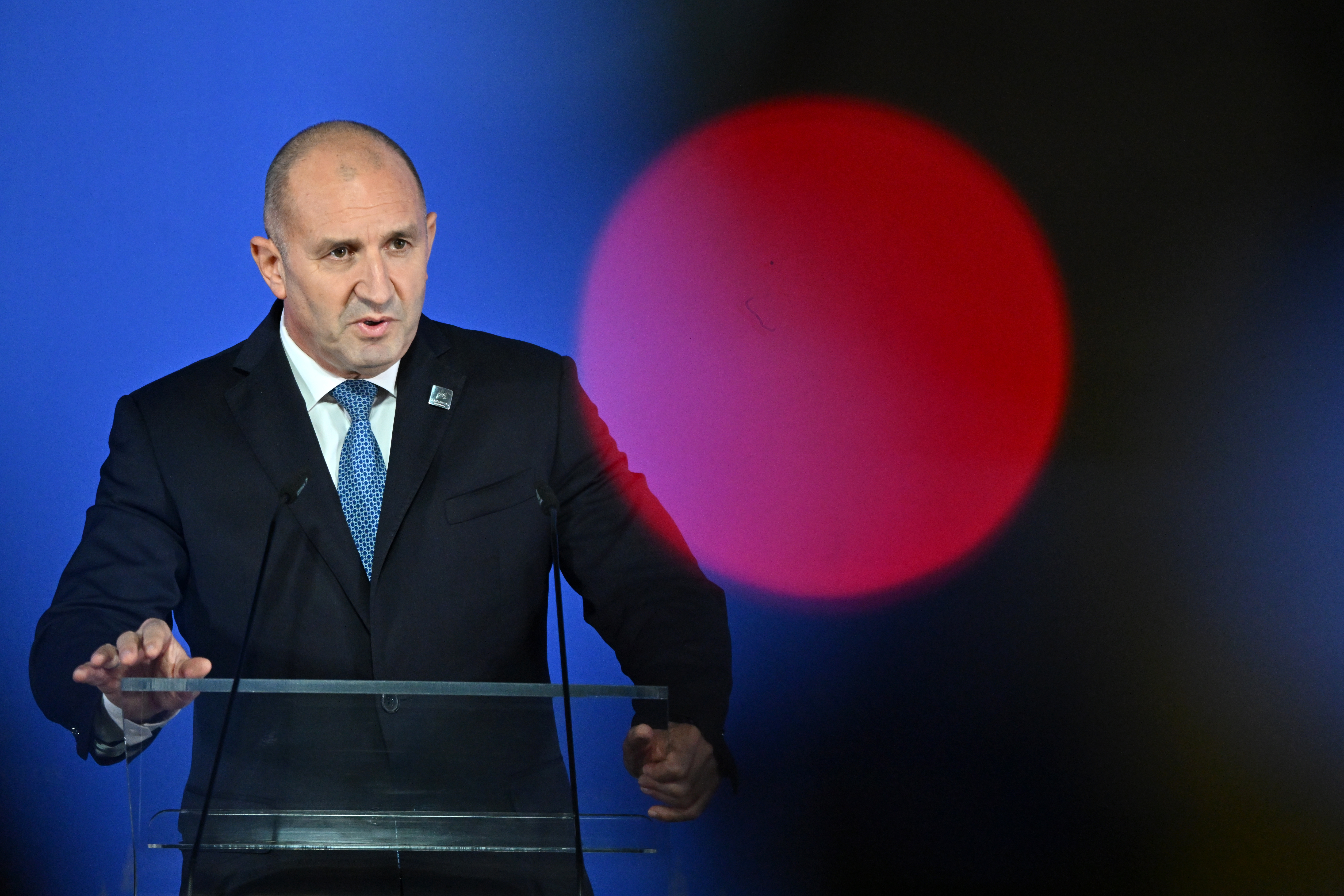 Bulgaria's President Rumen Radev speaks at a podium.