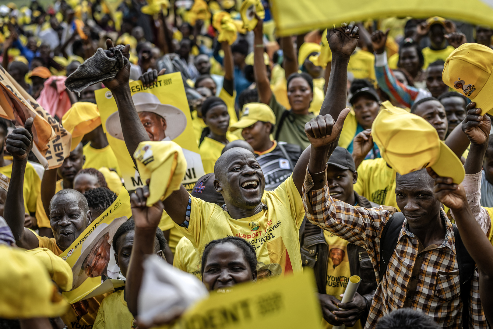 Supporters of Uganda&rsquo;s incumbent president and National Resistance Movement (NRM) presidential candidate Yoweri Museveni celebrate during a party gathering for the announcement of final results for the 2026 Ugandan presidential election at Lugogo Grounds in Kampala on Jan. 17, 2026. [Luis Tato/AFP]