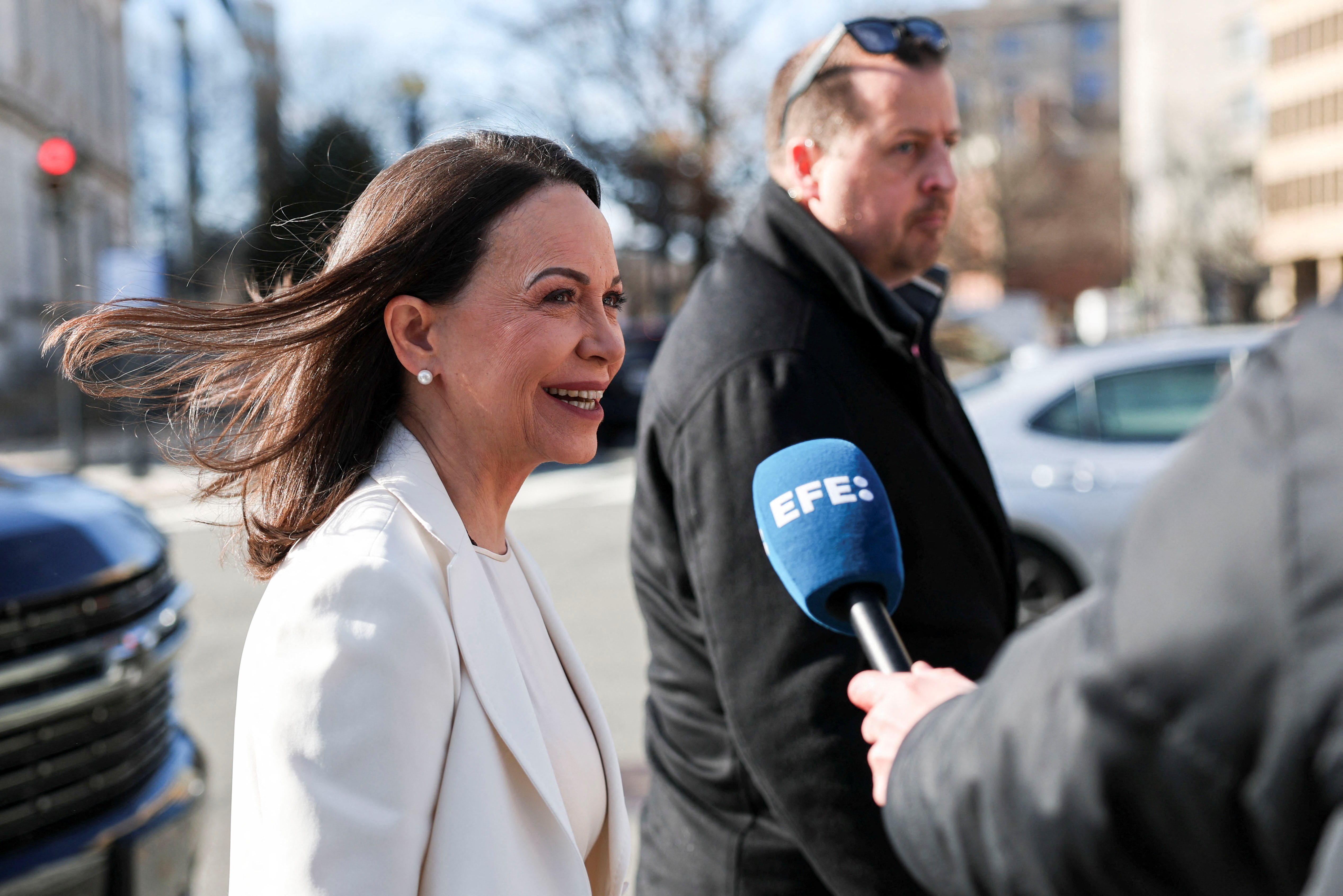 Venezuelan opposition leader Maria Corina Machado walks on the day of a meeting with U.S. President Donald Trump at the White House in Washington, D.C., U.S., January 15, 2026. REUTERS/Kylie Cooper