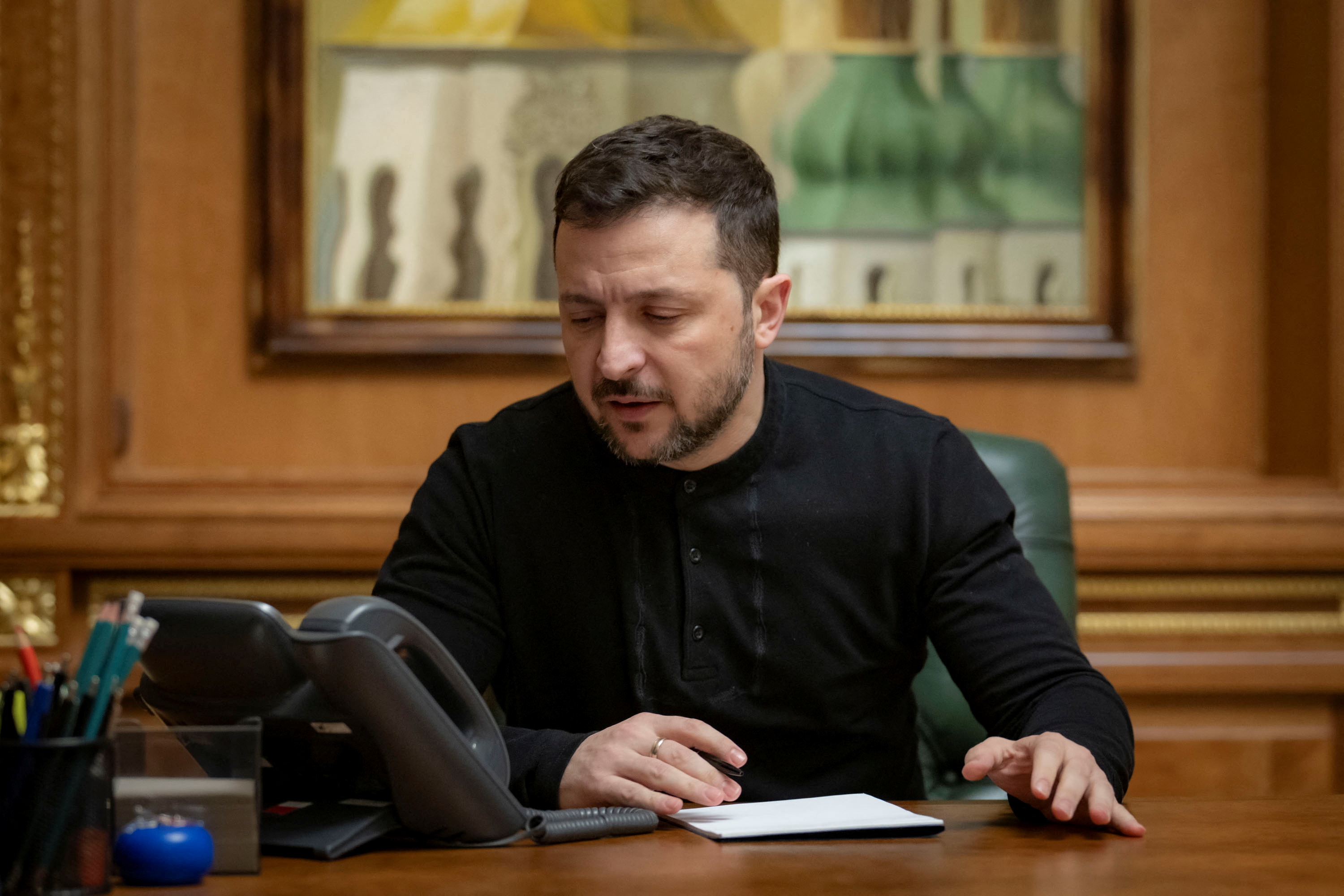 Ukraine's President Volodymyr Zelenskiy speaks with U.S. President Donald Trump via a phone line, amid Russia's attack on Ukraine, in Kyiv, Ukraine February 12, 2025. Ukrainian Presidential Press Service/Handout via REUTERS ATTENTION EDITORS - THIS IMAGE HAS BEEN SUPPLIED BY A THIRD PARTY.