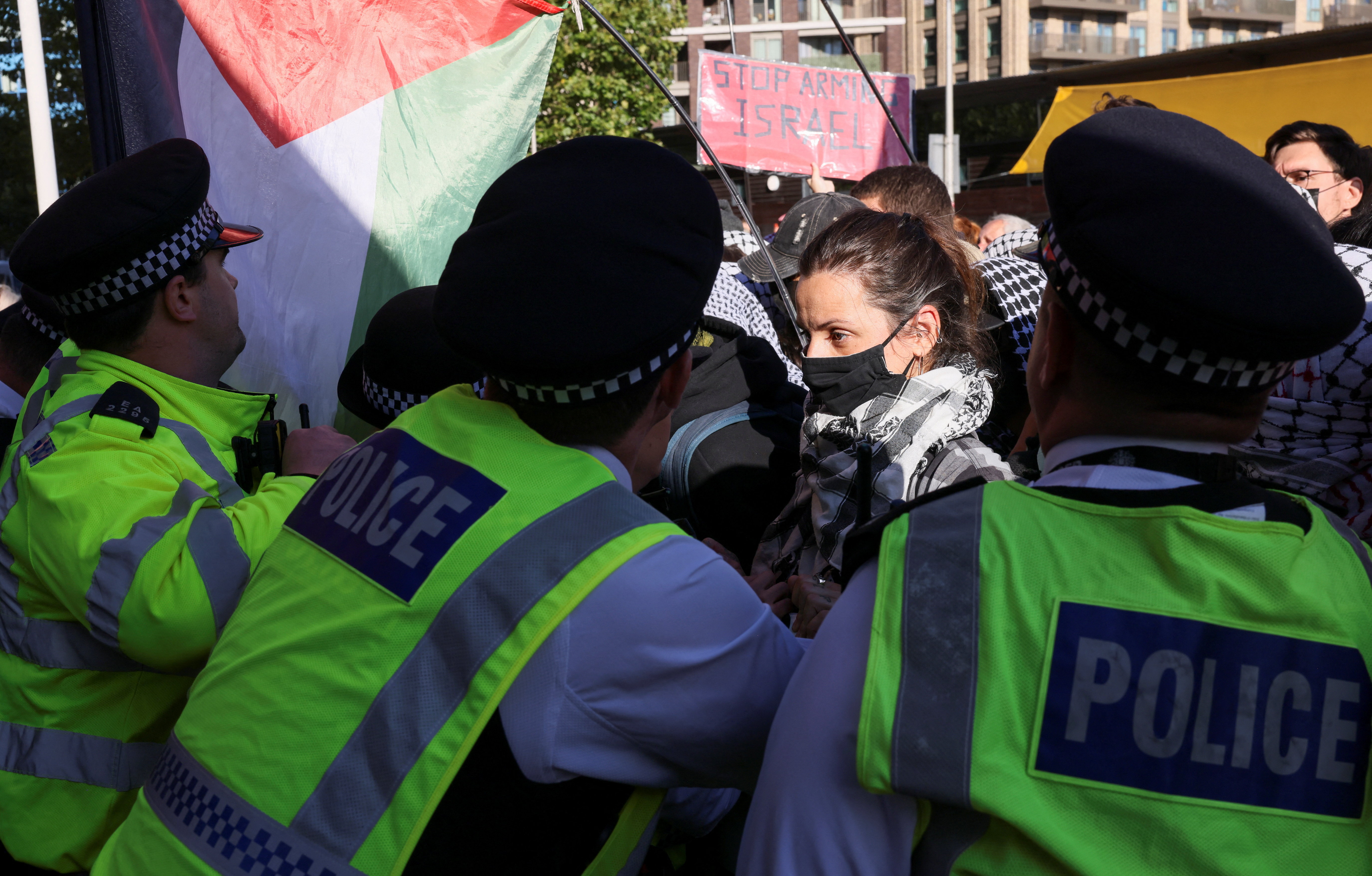 Police officers try to hold back demonstrators during a protest against UK arms exports and Israeli weapons firms amid the war in Gaza, outside the Defence and Security Equipment International (DSEI) arms fair in London, Britain, September 9, 2025. REUTERS/Jack Taylor