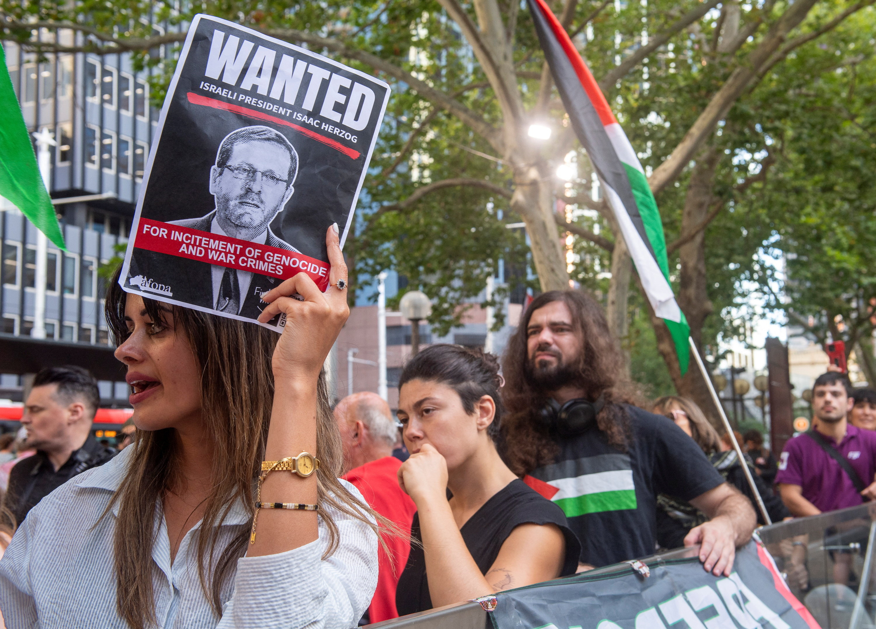 Pro-Palestinian protesters demonstrate during a rally at Town Hall calling for a ban on Israeli President Isaac Herzog's visit to Australia, in Sydney, Australia, January 16, 2026. REUTERS/ Jeremy Piper