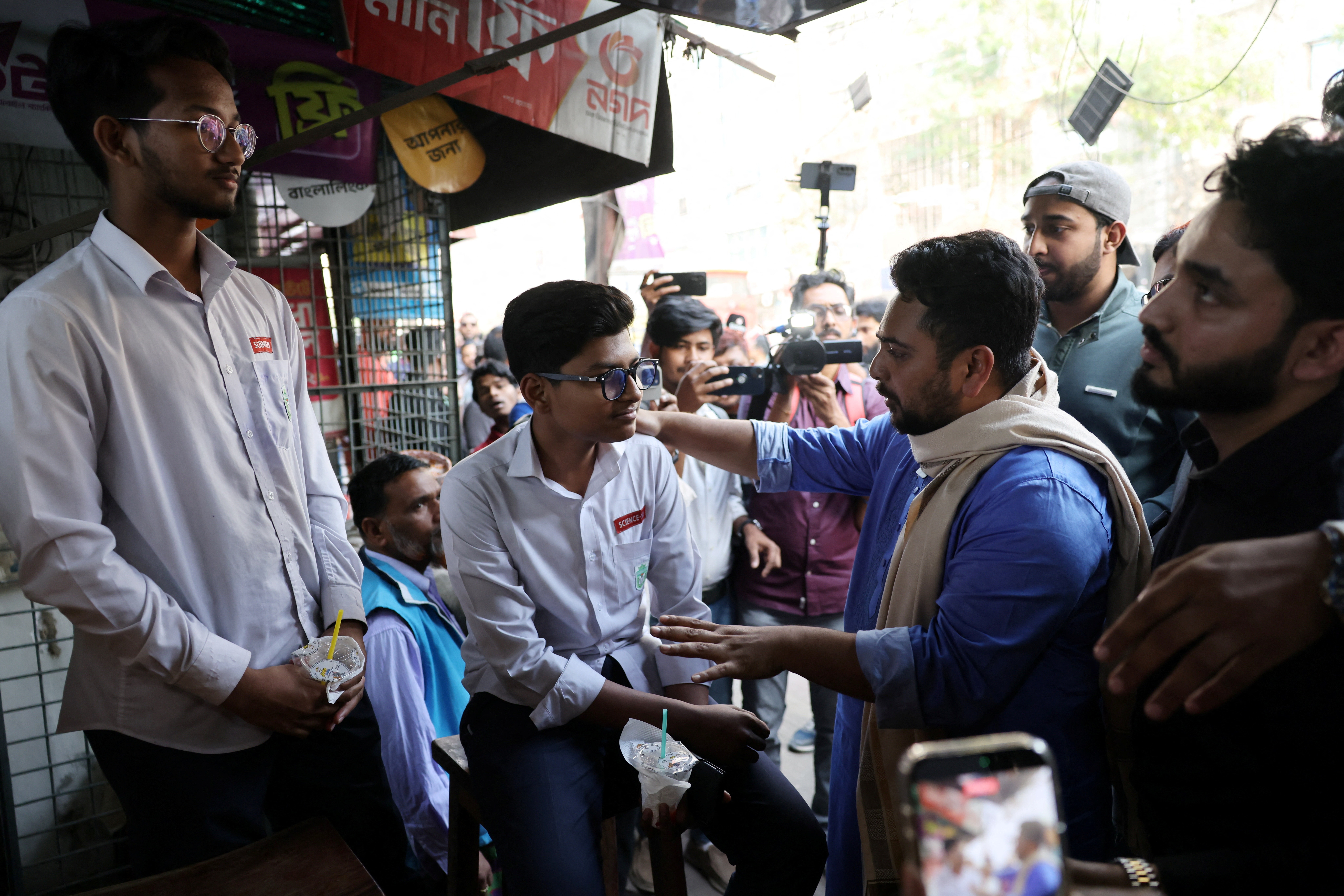 Nahid Islam, the convener of student-led National Citizen Party (NCP) and a candidate for the national election, interacts with students during a campaign at Rampura area, in Dhaka, Bangladesh, January 27, 2026. REUTERS/Mohammad Ponir Hossain