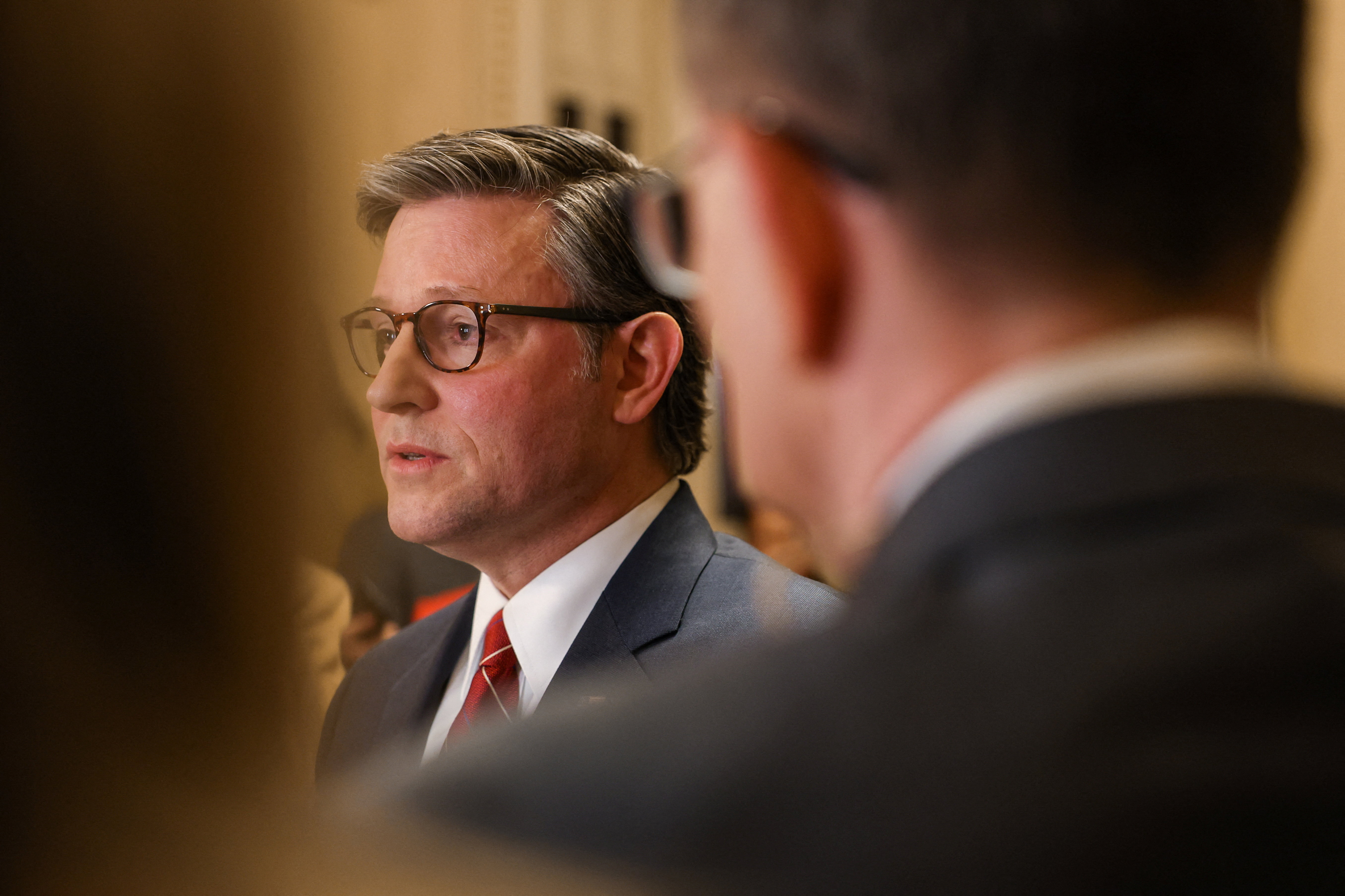 The spending package funds most government programmes through September 30 but will only fund the Department of Homeland Security until next Friday [Kylie Cooper/Reuters]