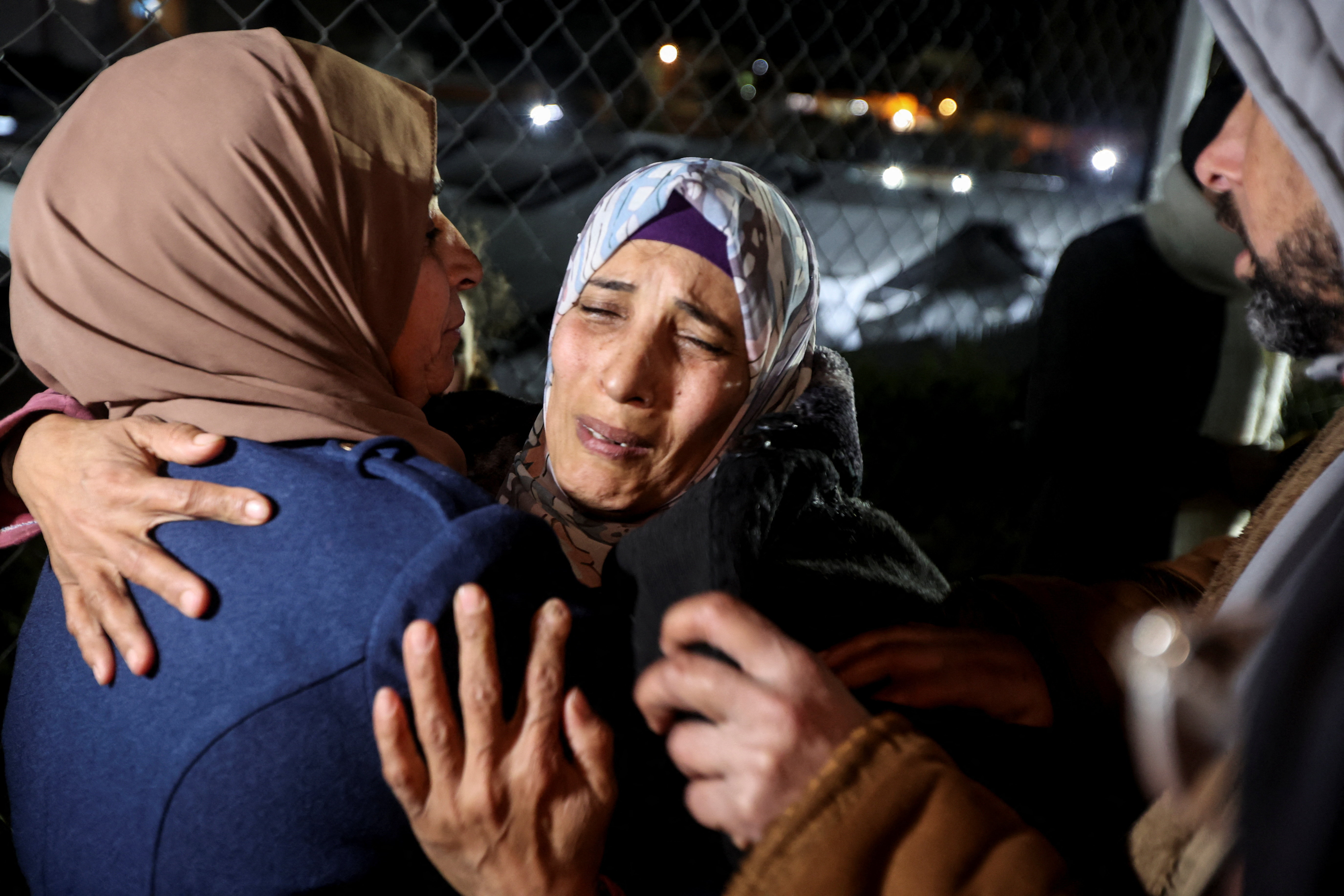 Palestinians coming from Rafah crossing react as they arrive at Nasser Hospital in Khan Younis in the southern Gaza Strip