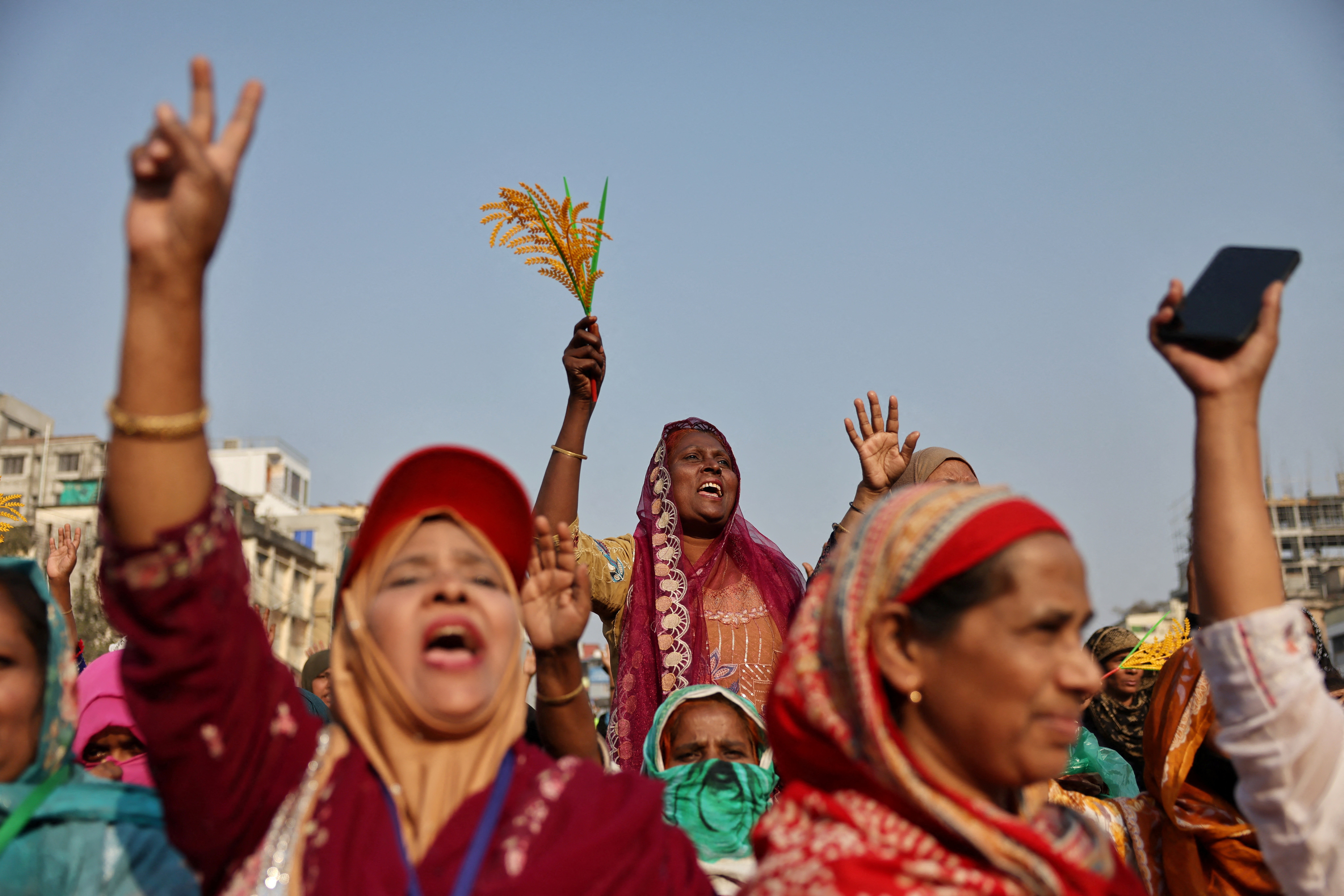 Supporters of the Bangladesh Nationalist Party (BNP) chant slogans as they joined in at election campaign rally attended by the party chairman, Tarique Rahman, ahead of the national election at Pallabi, in Dhaka, Bangladesh, February 8, 2026. [Mohammad Ponir Hossain/Reuters]