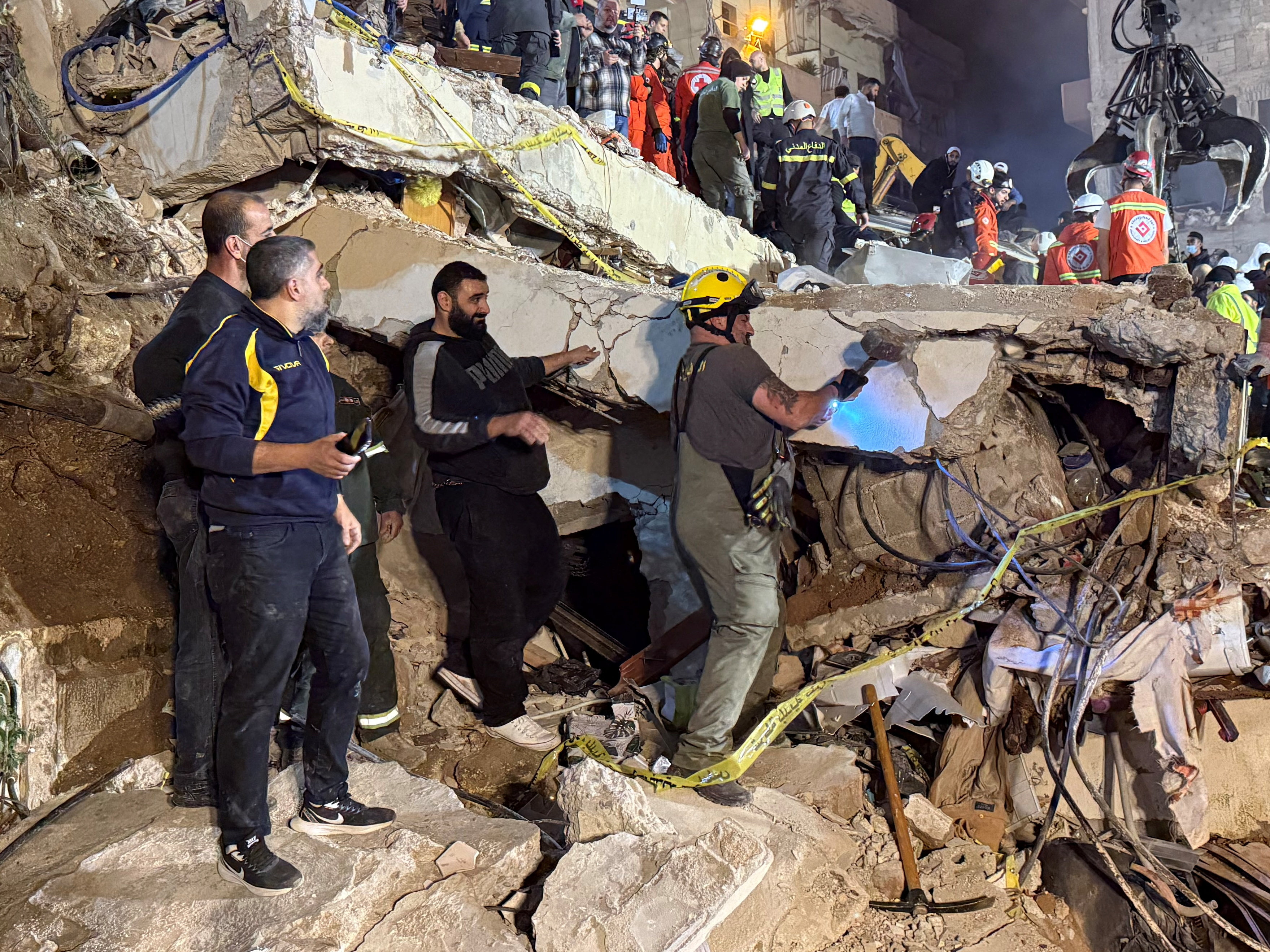 Rescue teams search for survivors after a building collapsed
