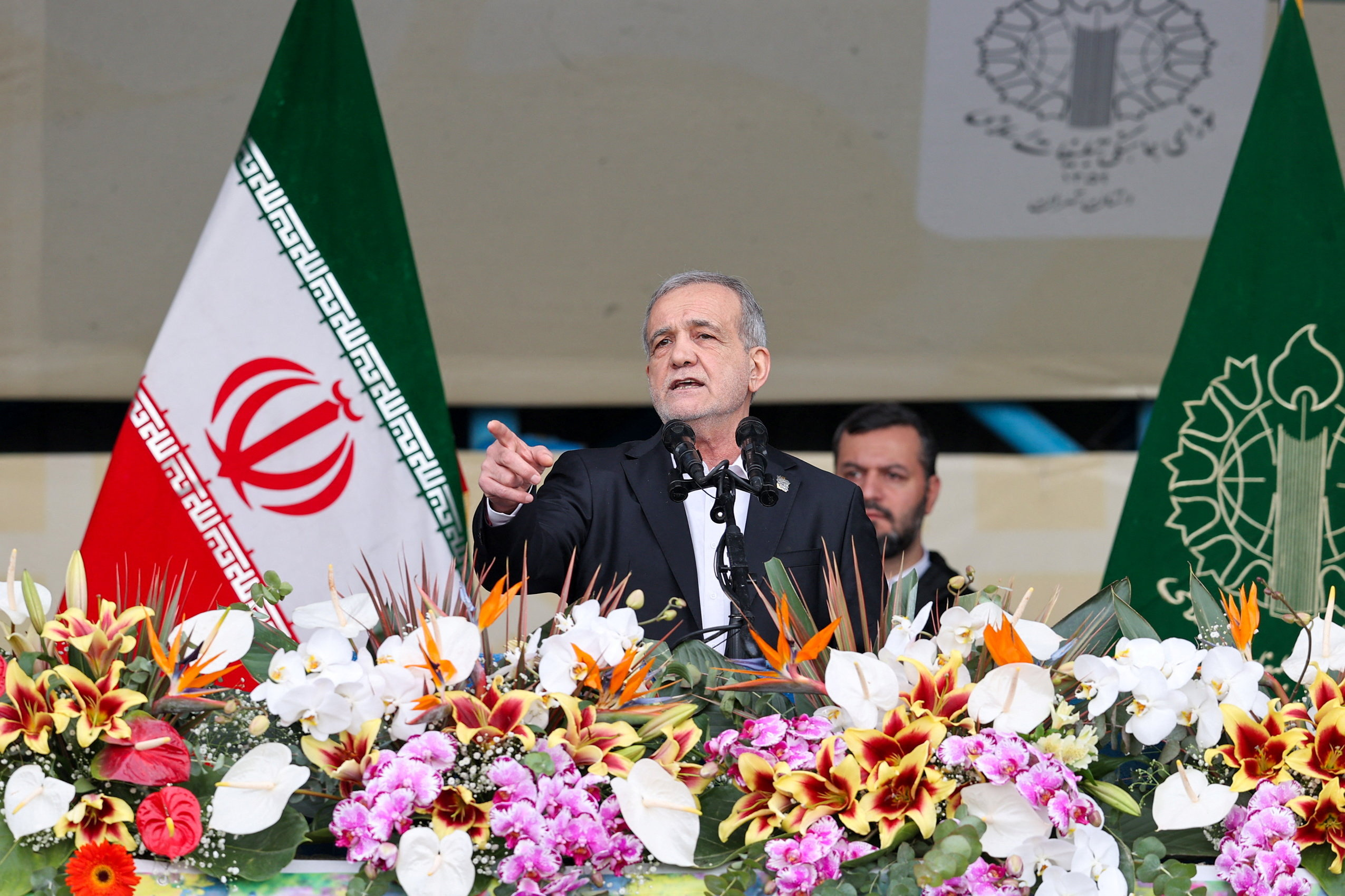 Iranian President Masoud Pezeshkian speaks during the 47th anniversary of the Islamic revolution in Tehran