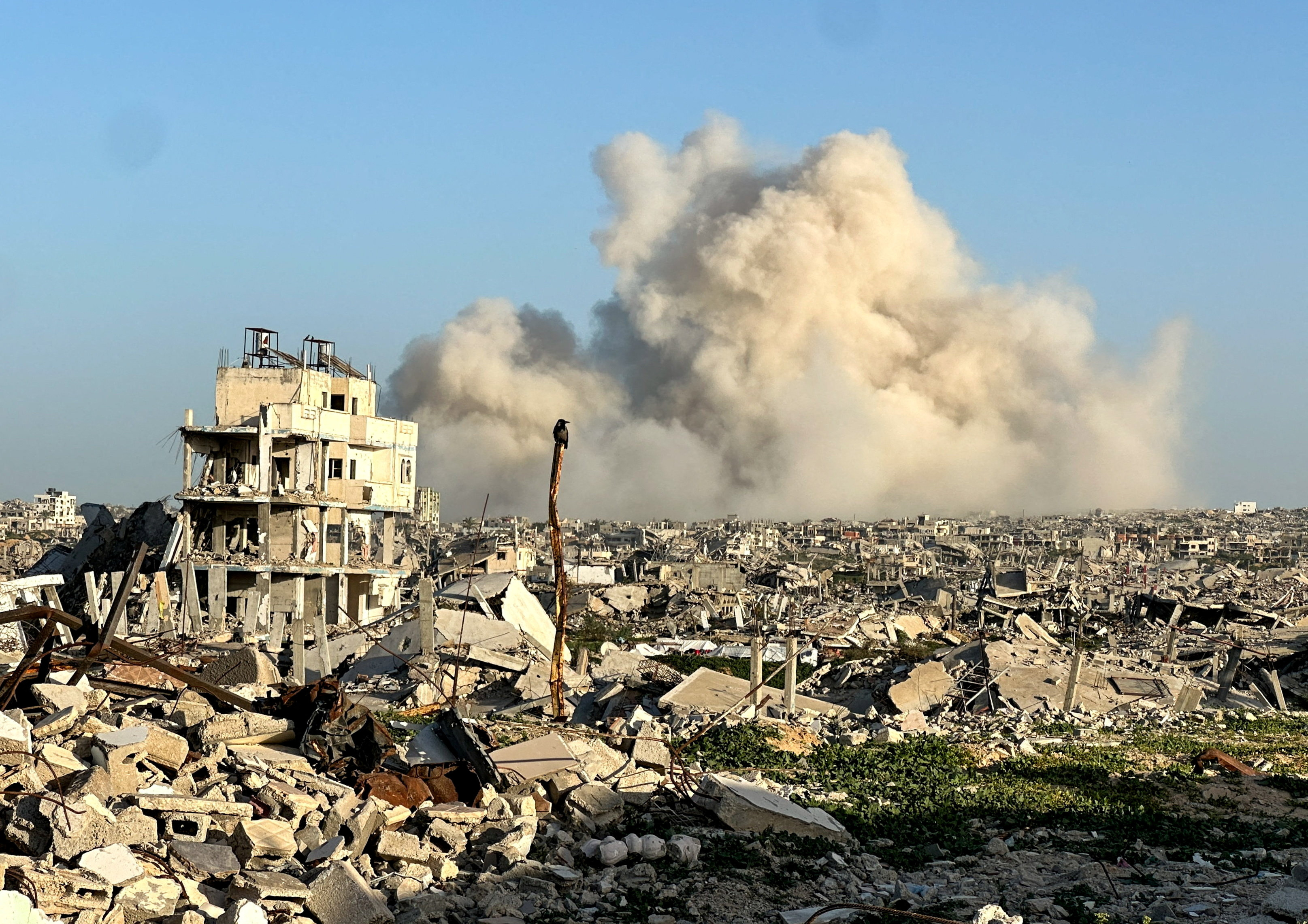 Smoke rises following an explosion, within the "yellow line" zone, which is controlled by Israel, in Khan Younis in the southern Gaza Strip, February 10, 2026.