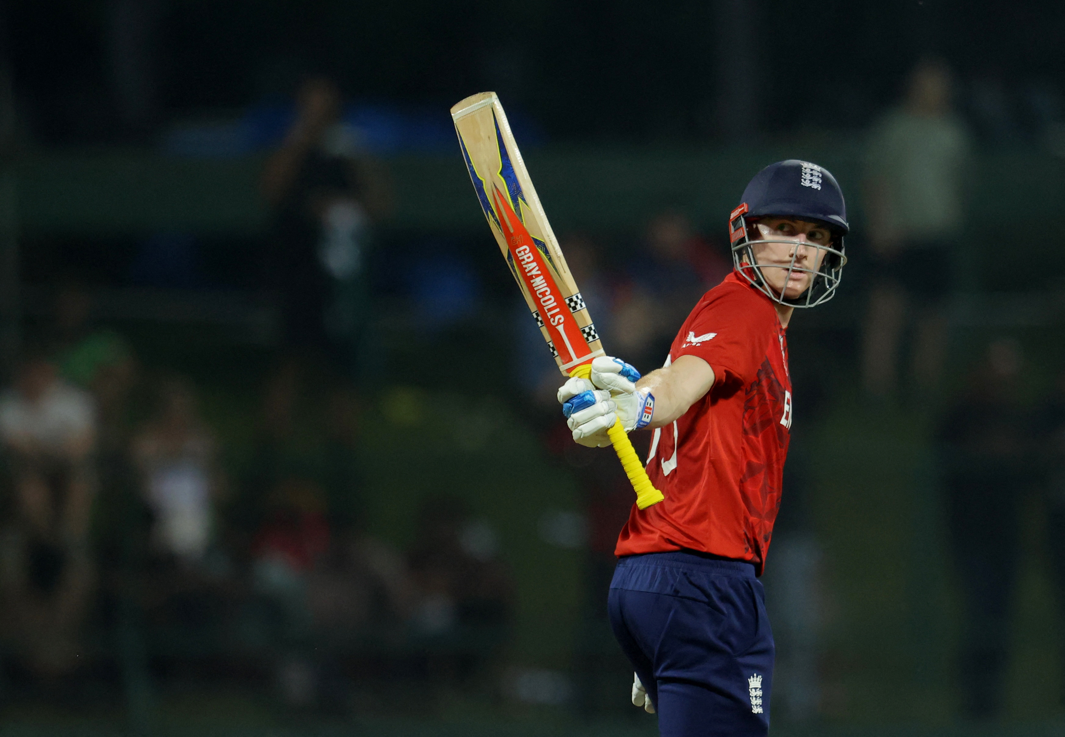 Cricket - ICC Men's T20 World Cup 2026 - Super 8 - England v Pakistan - Pallekele International Cricket Stadium, Kandy, Sri Lanka - February 24, 2026 England's Harry Brook celebrates after reaching his half century REUTERS/Lahiru Harshana
