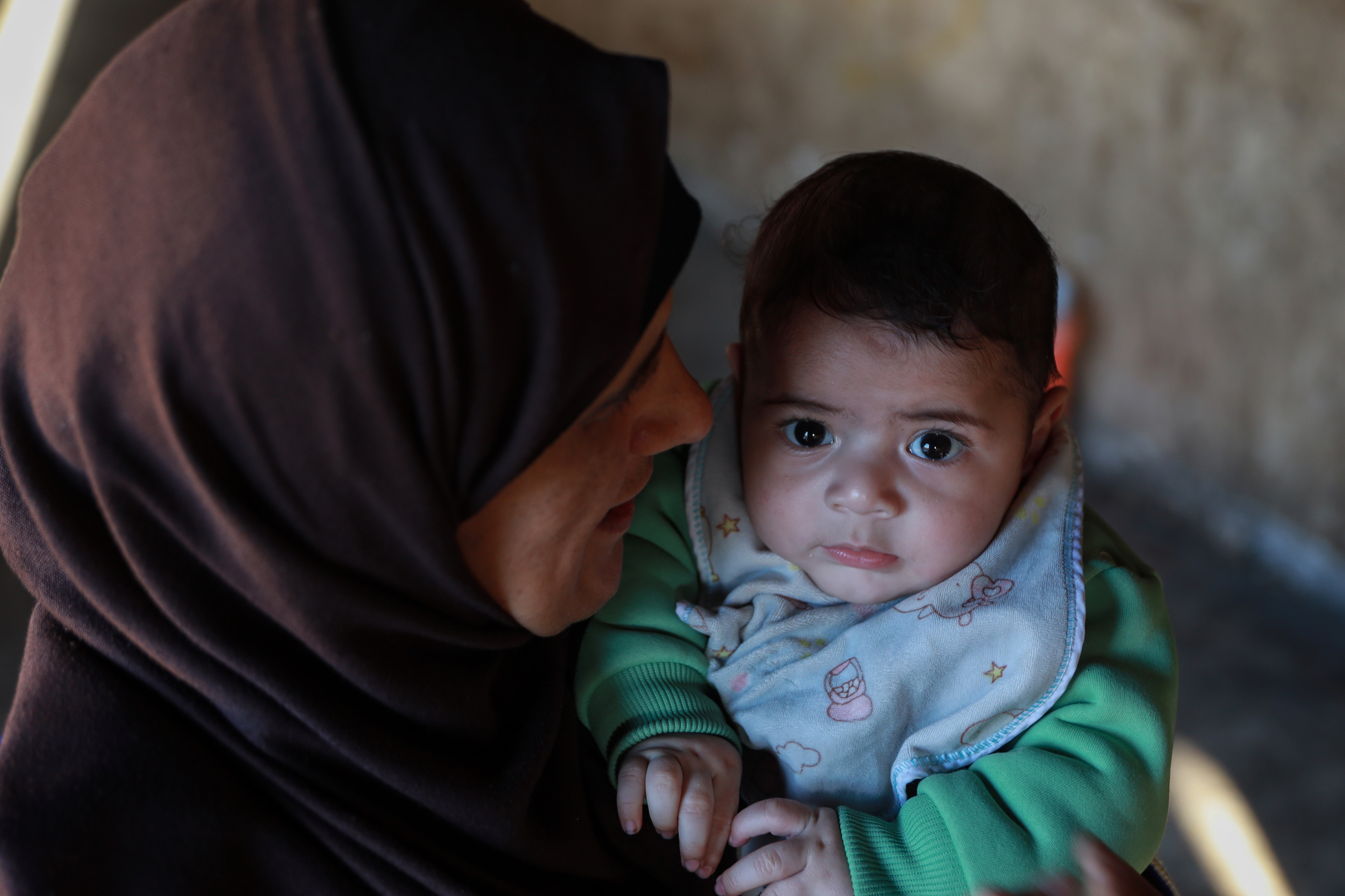 Gaza parenting story [Abdelhakim Abu Riash/Al Jazeera] (RESTRICTEF)