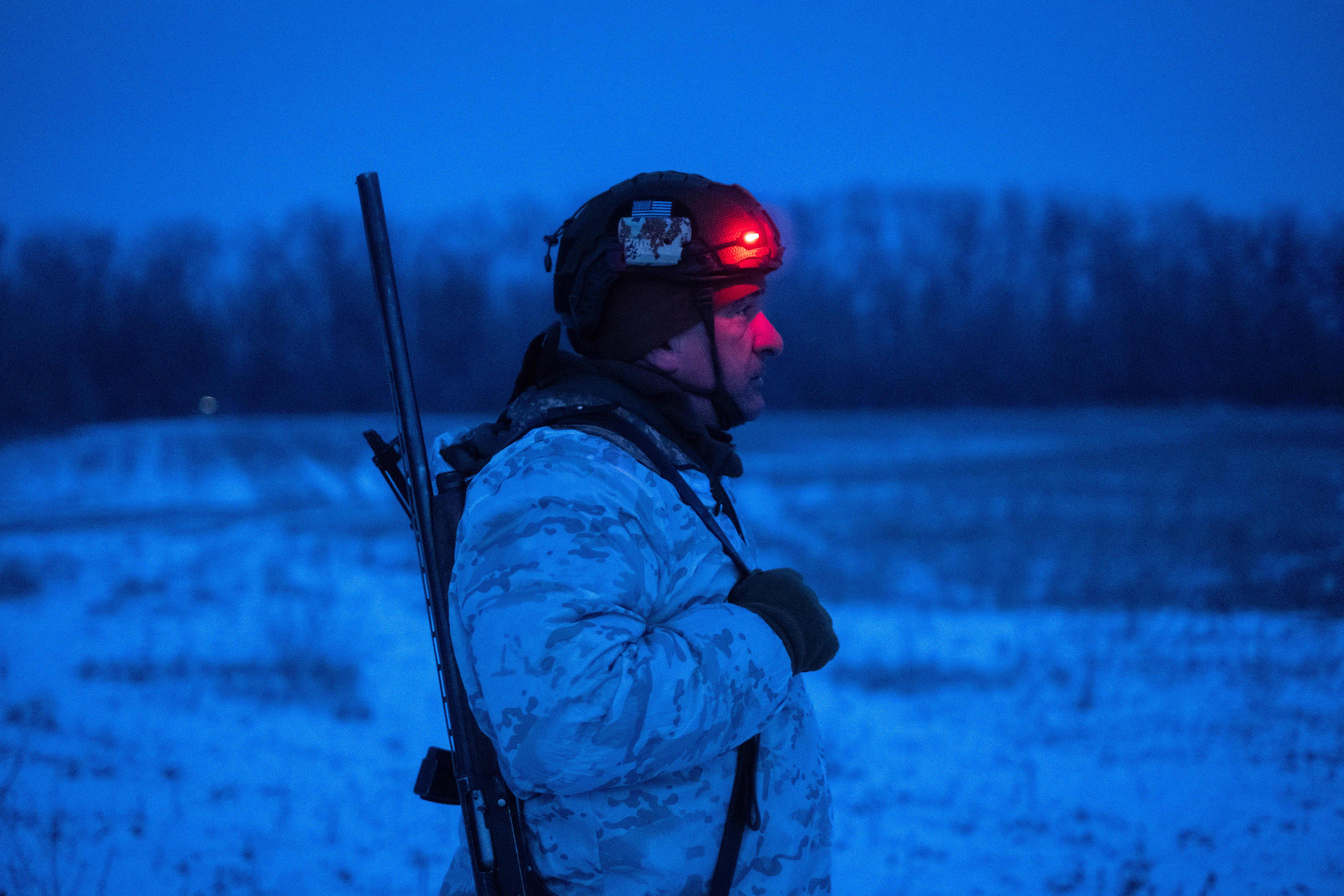 A Ukrainian soldier stands in a field at an undisclosed location near Druzhkivka, Donetsk region, amid the Russian invasion of Ukraine. [AIryna Rybakova /AFP]