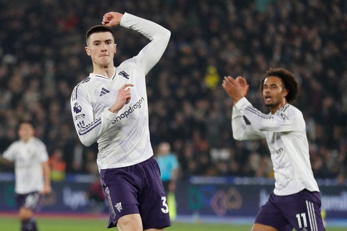 Manchester United's Slovenian striker #30 Benjamin Sesko celebrates after scoring their first goal during the English Premier League football match
