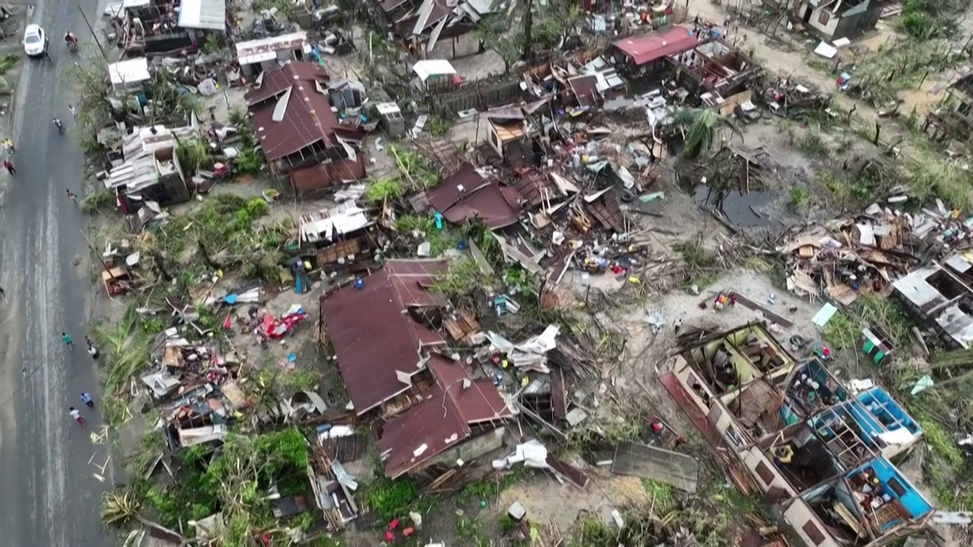 An aerial view of Toamasina, Madagascar shows homes destroyed by Cyclone Gezani on February 11, 2026. [Screenshot via AFP]