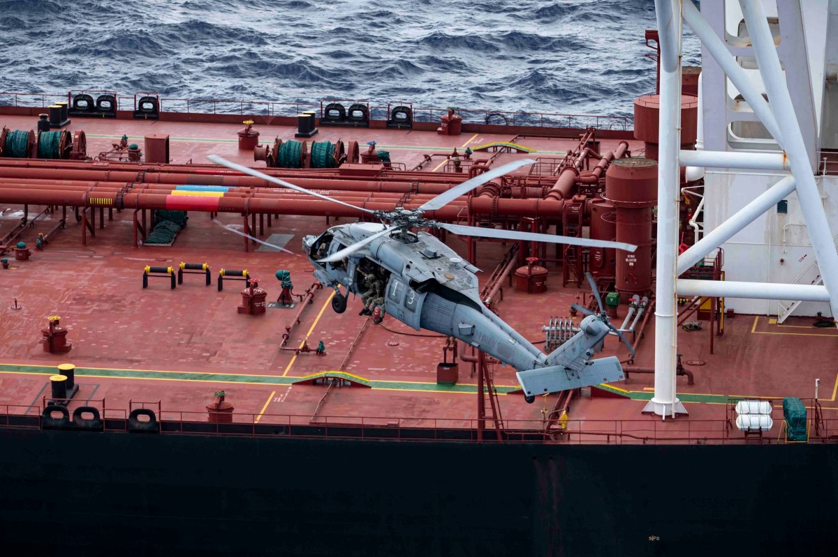 This photo posted on the X account of the US Department of Defense on February 15, 2026 shows what the Department of Defense says are US military forces boarding an oil tanker, the Veronica III, in the Indian Ocean. US forces boarded an oil tanker in the Indian Ocean that violated President Donald Trump's blockade of sanctioned vessels in the Caribbean and fled the region, the Pentagon said Sunday.