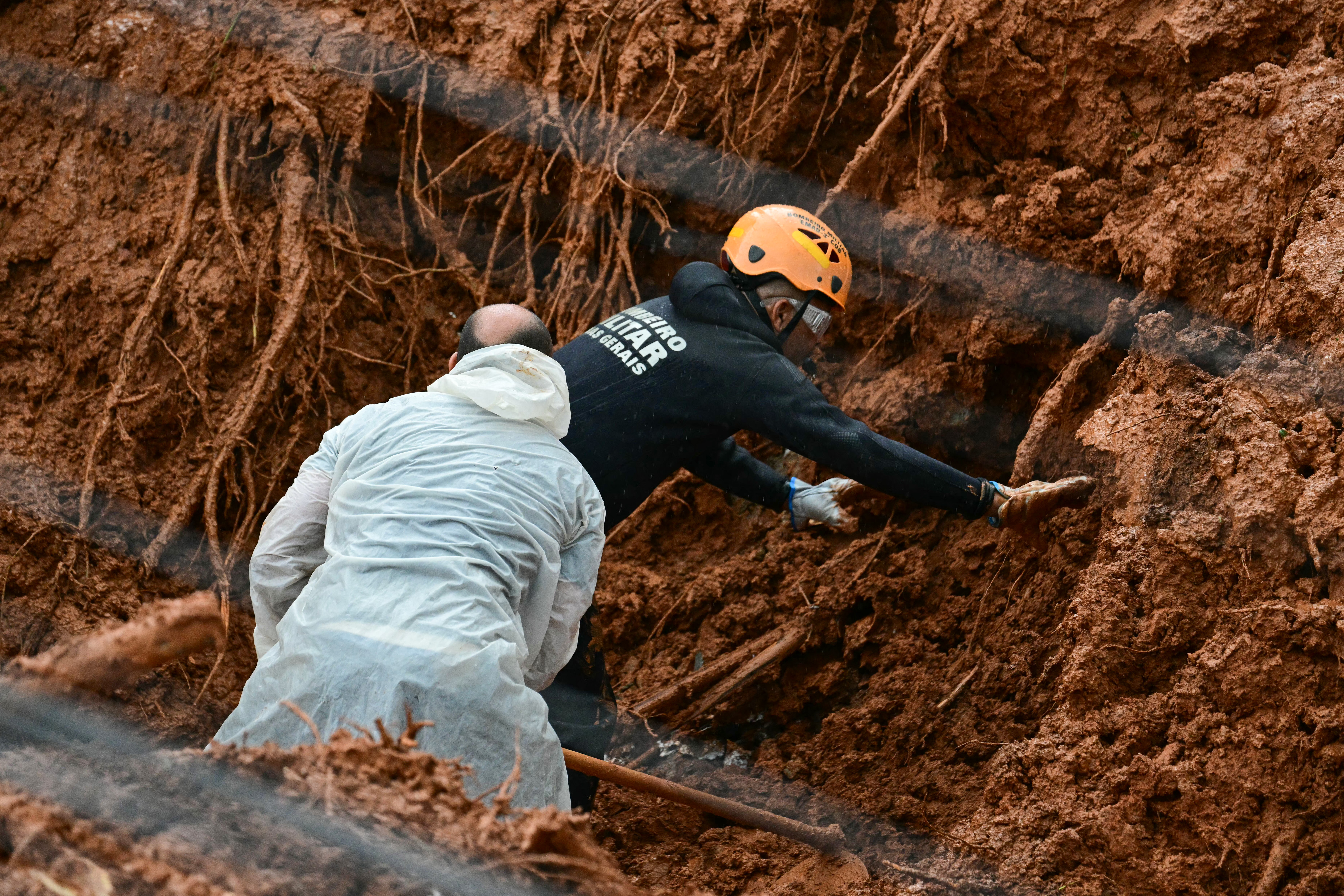 Rescuers search for missing after deluge kills 30 in Brazil