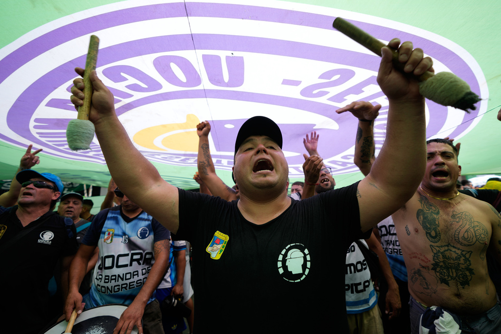 Protesters chant during a pro-labour demonstration