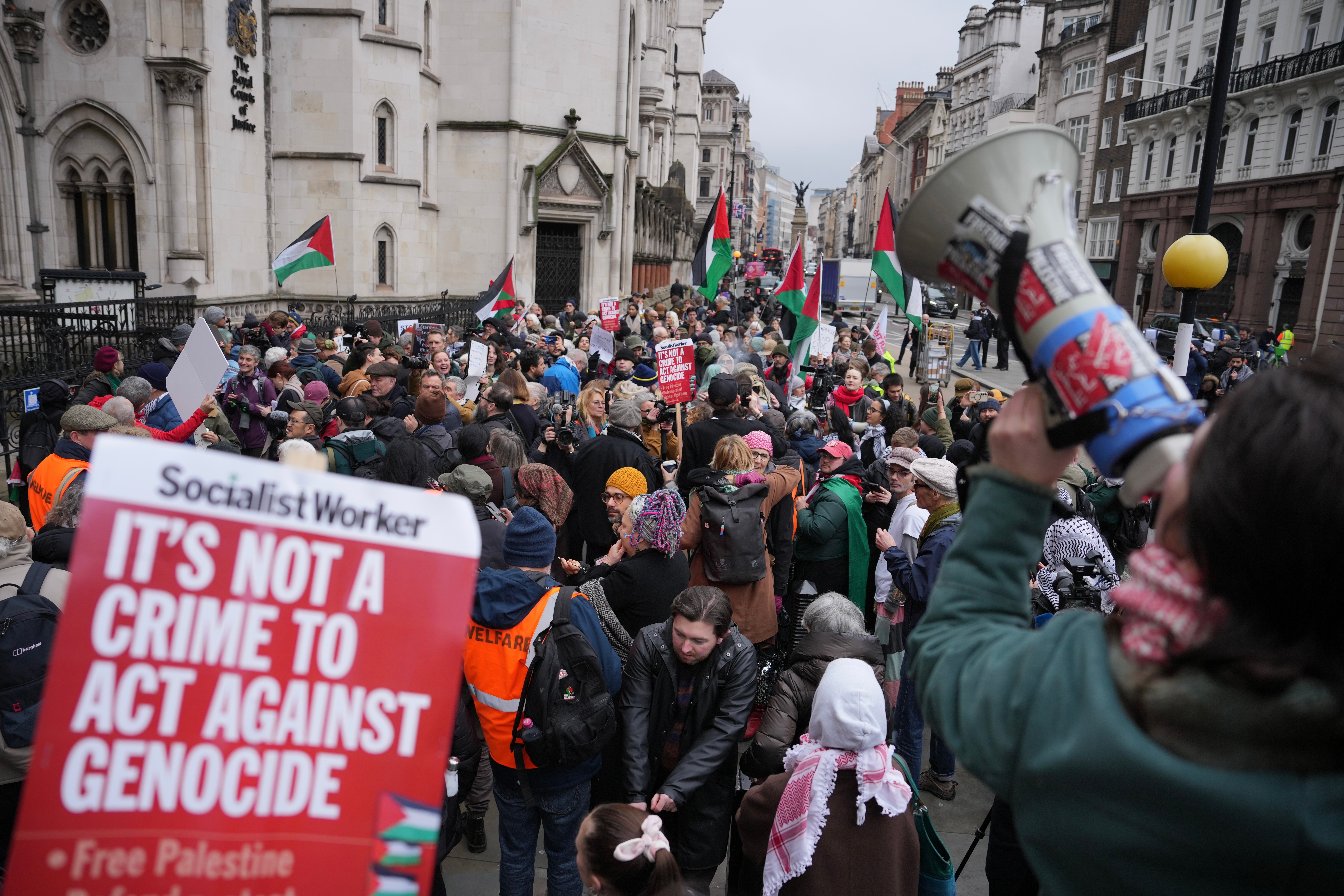 Supporters of Palestine Action stage a protest outside the Royal Court of Justice in London