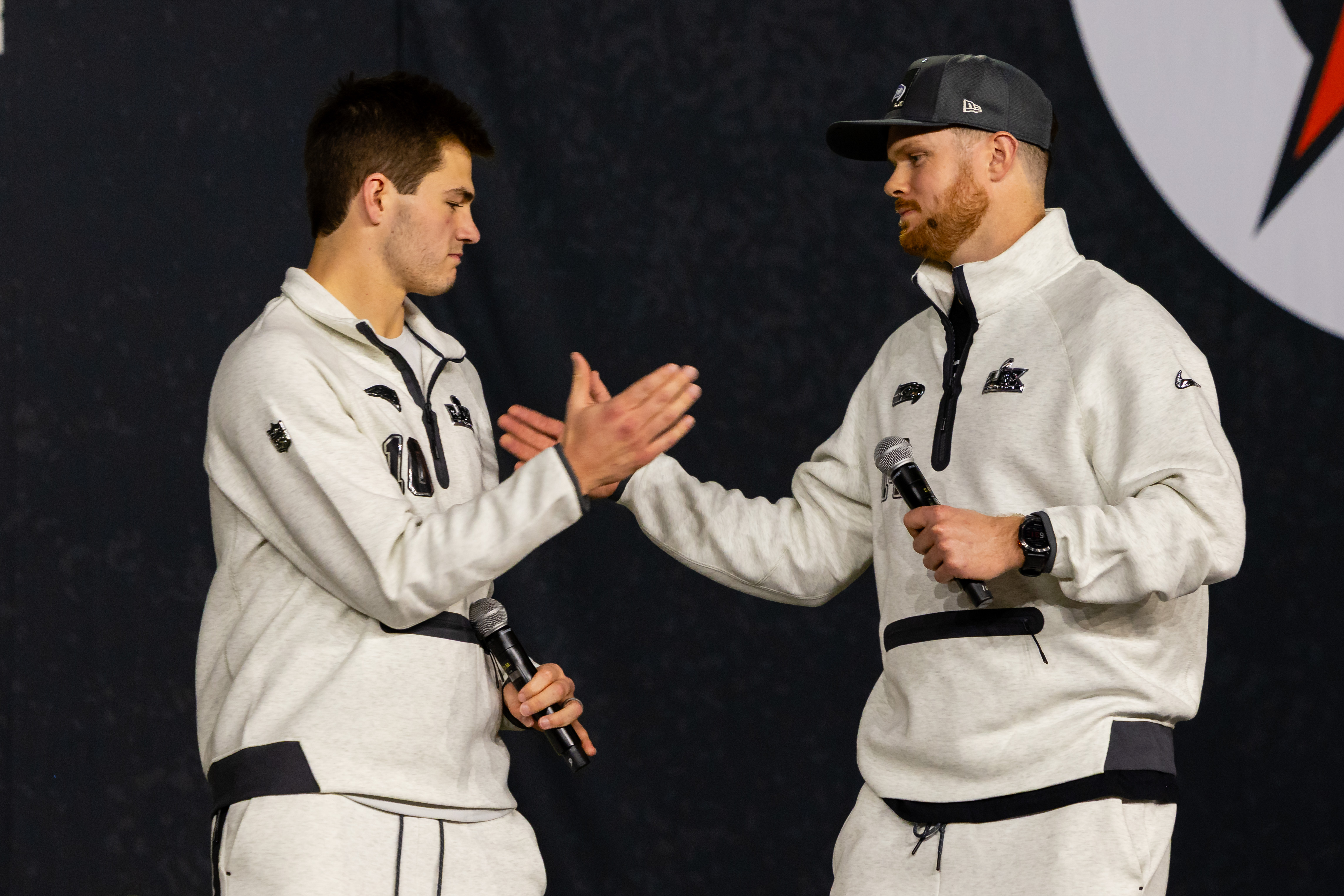 Drake Maye and Sam Darnold react.