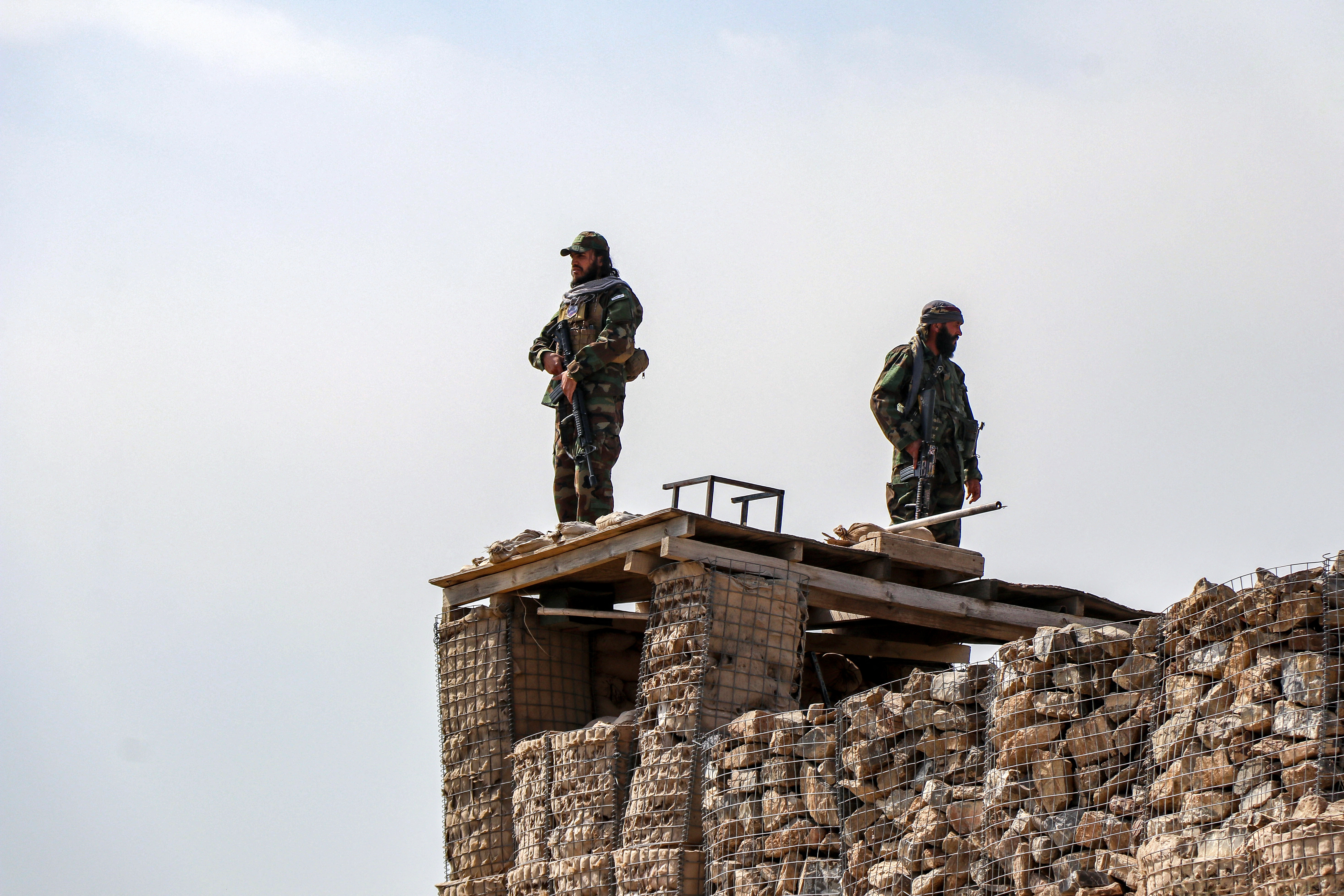 Taliban security personnel keep watch near the Durand Line in Gurbuz district of Khost province on February 27, 2026 following overnight cross-border fighting between Pakistan and Afghanistan.