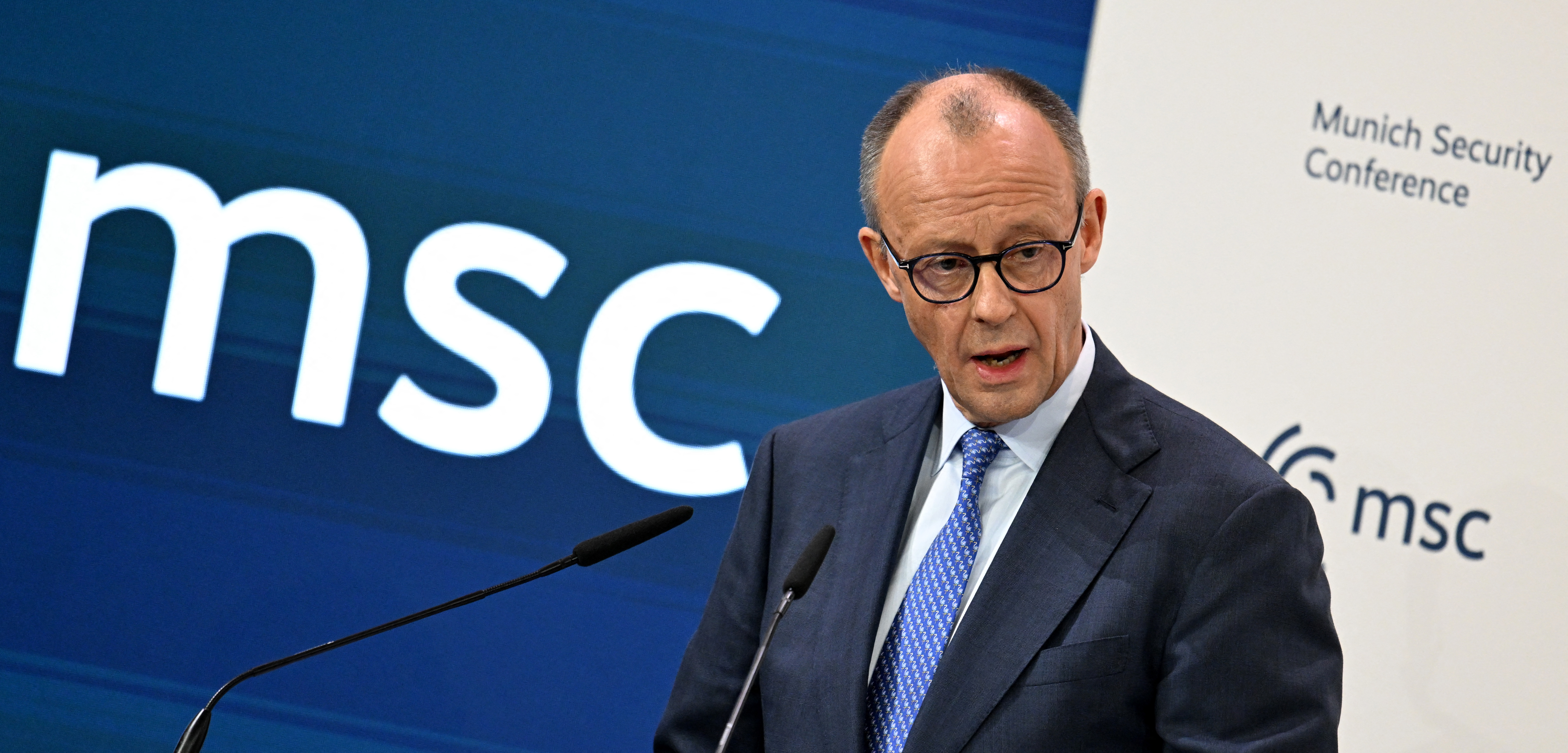 German Chancellor Friedrich Merz gives a speech.