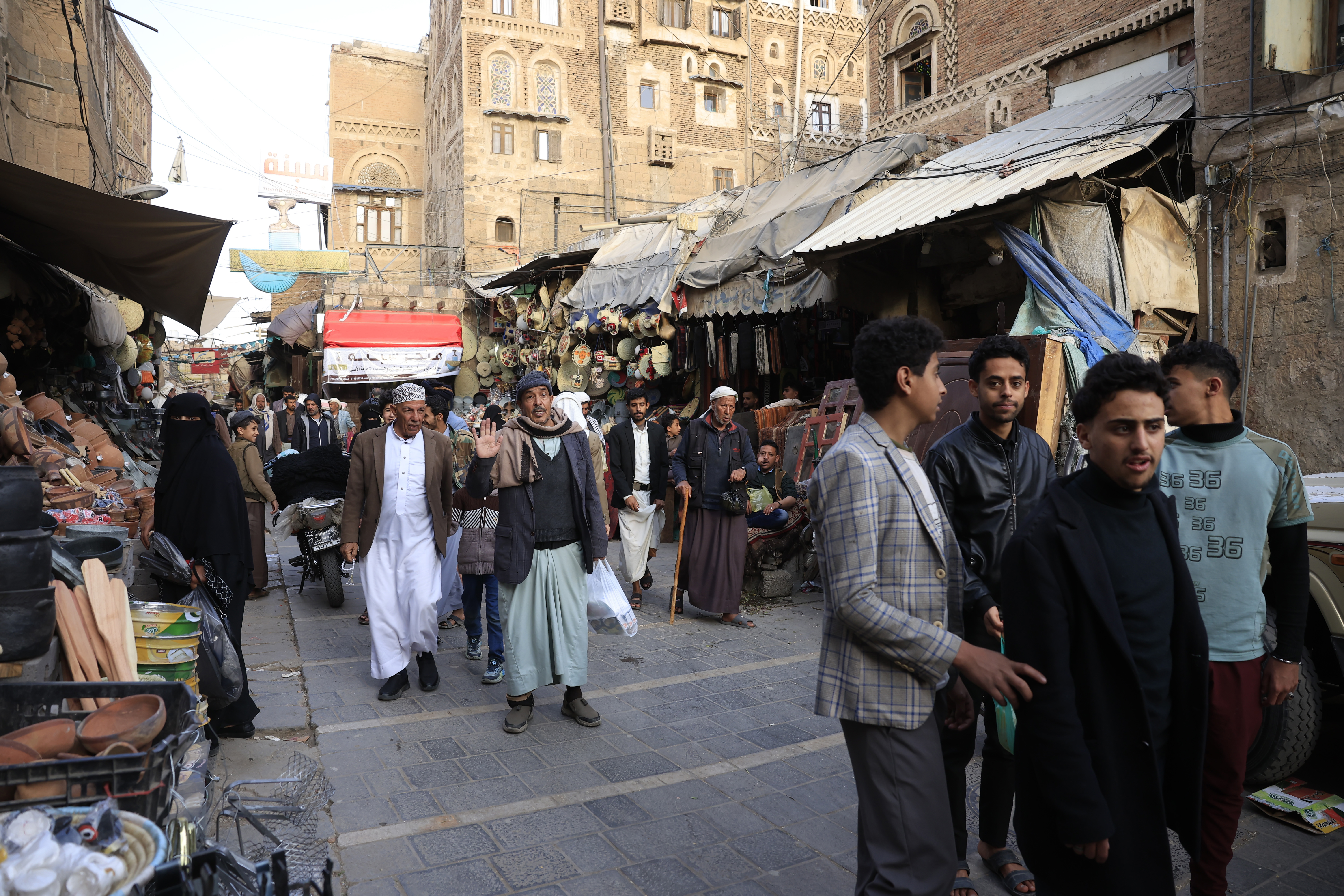 epa12751633 People walk through a market ahead of the fasting month of Ramadan in Sana'a, Yemen, 17 February 2026. Ramadan is expected to begin on 18 February 2026, depending on the sighting of the new crescent moon. Muslims around the world celebrate the holy month of Ramadan by praying during the nighttime and abstaining from eating, drinking, and sexual acts during the period between sunrise and sunset. EPA/YAHYA ARHAB