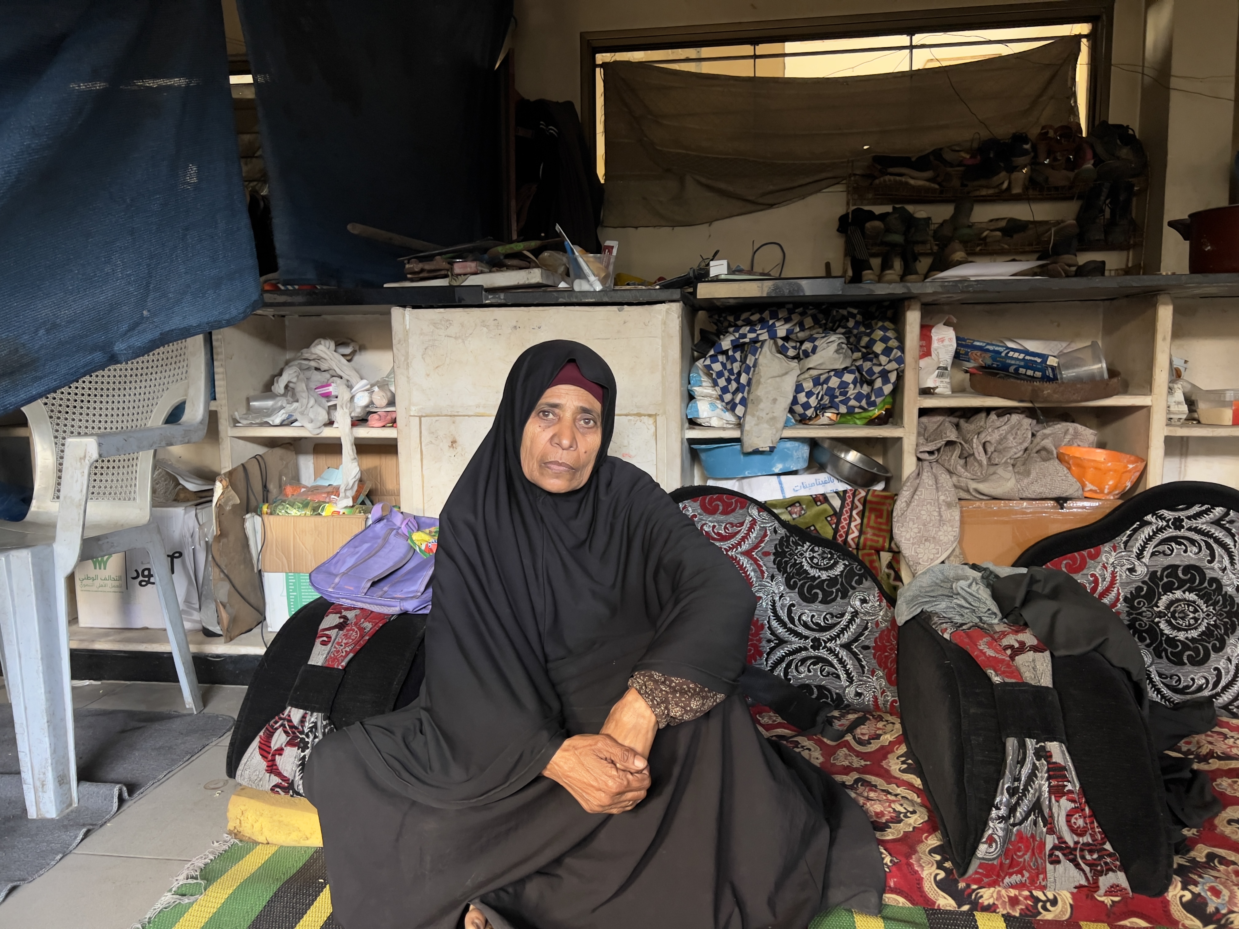Kefaya Al-Assar, 73, from Jabalia in northern Gaza, in a classroom at Al Ezz Ben Abdelsalam School in Al Nusirat, [Ola al-Asi/Al Jazeera]