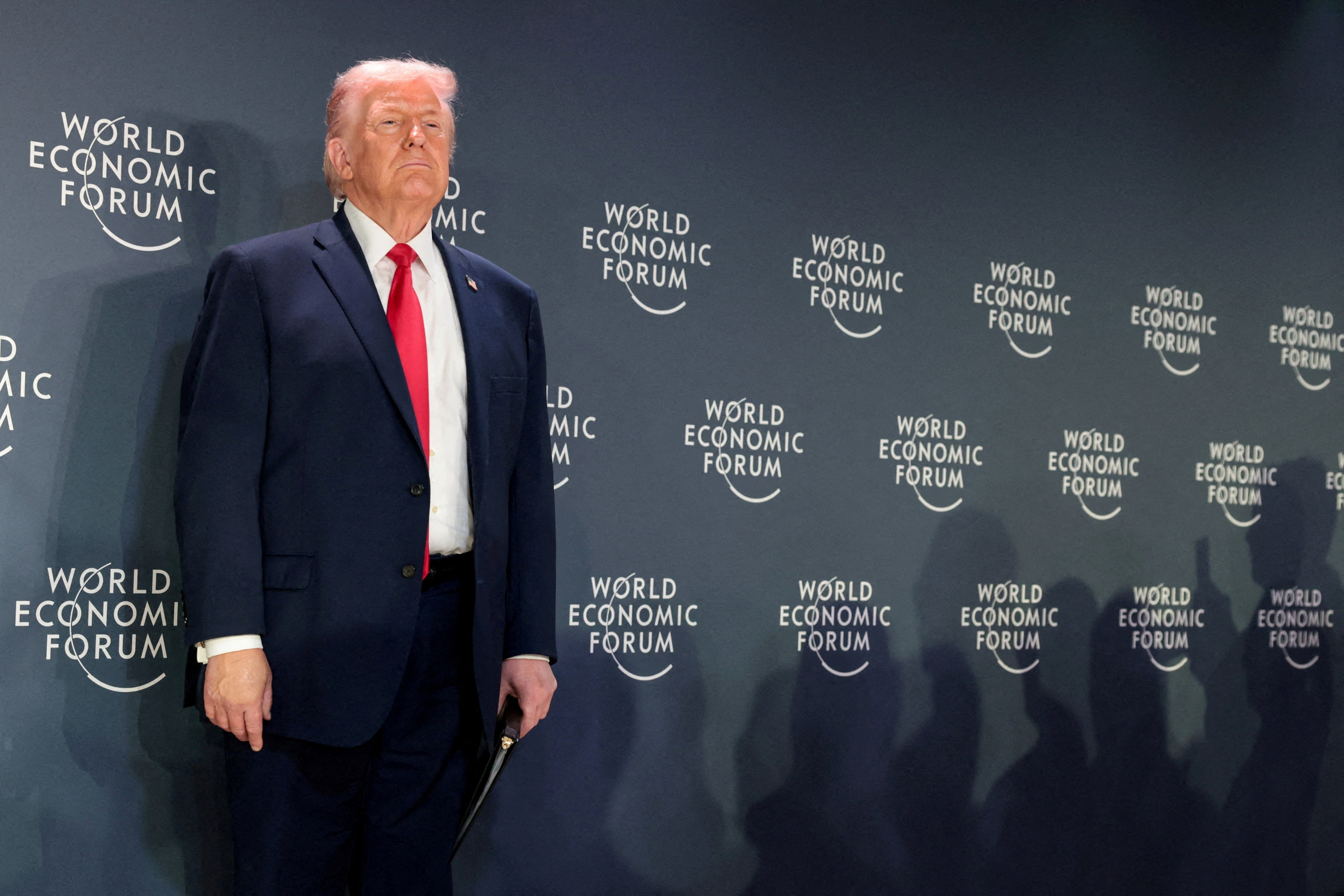 FILE PHOTO: U.S. President Donald Trump attends a reception with business leaders during the 56th annual World Economic Forum (WEF), in Davos, Switzerland, January 21, 2026. REUTERS/Jonathan Ernst/File Photo
