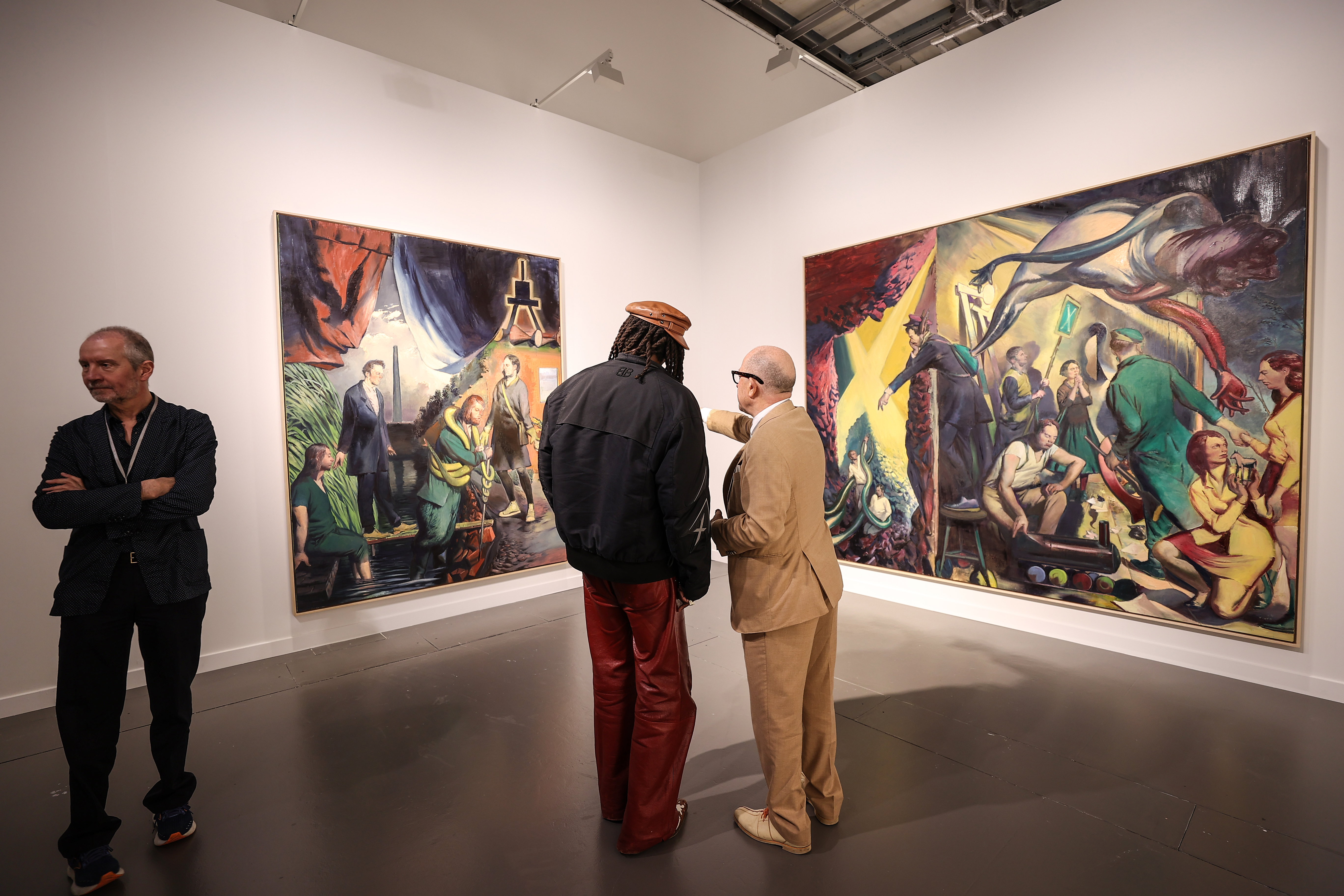 Visitors explore artworks and installations at the Art Basel Qatar Edition in Doha
