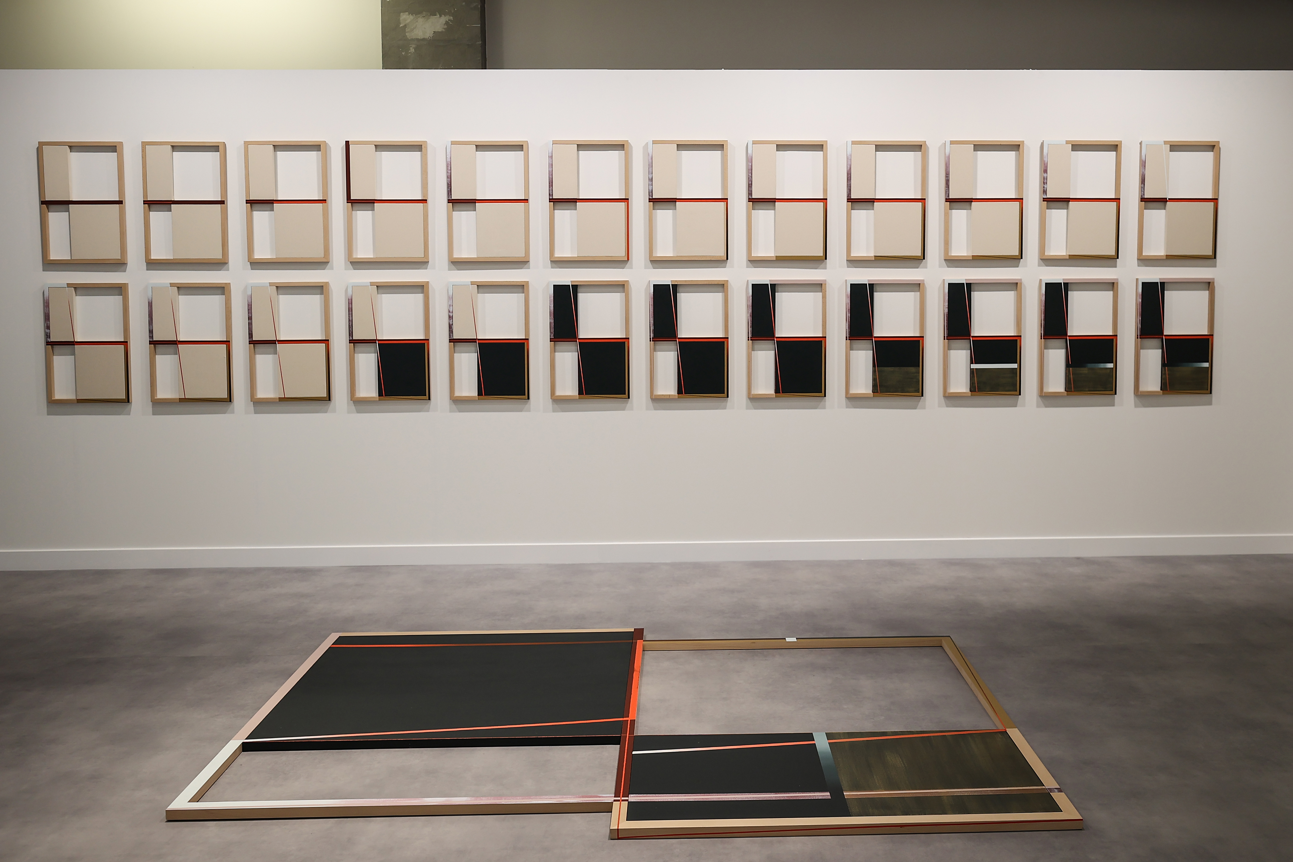 Visitors explore artworks and installations at the Art Basel Qatar Edition in Doha