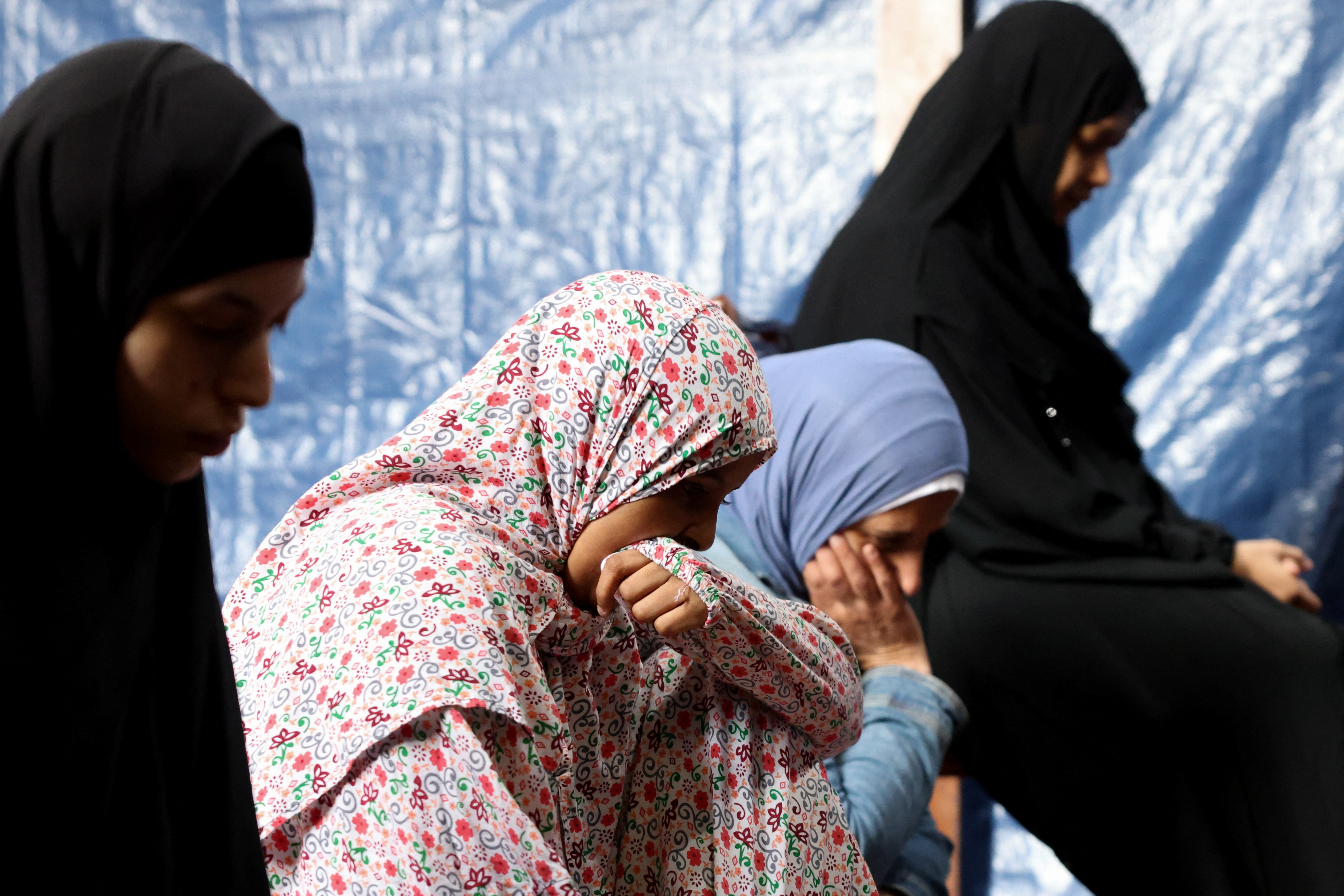 Muslim women attend Friday prayers at Iqraa Dunmurry Mosque in Belfast, Northern Ireland, August 9, 2024. REUTERS/Hollie Adams