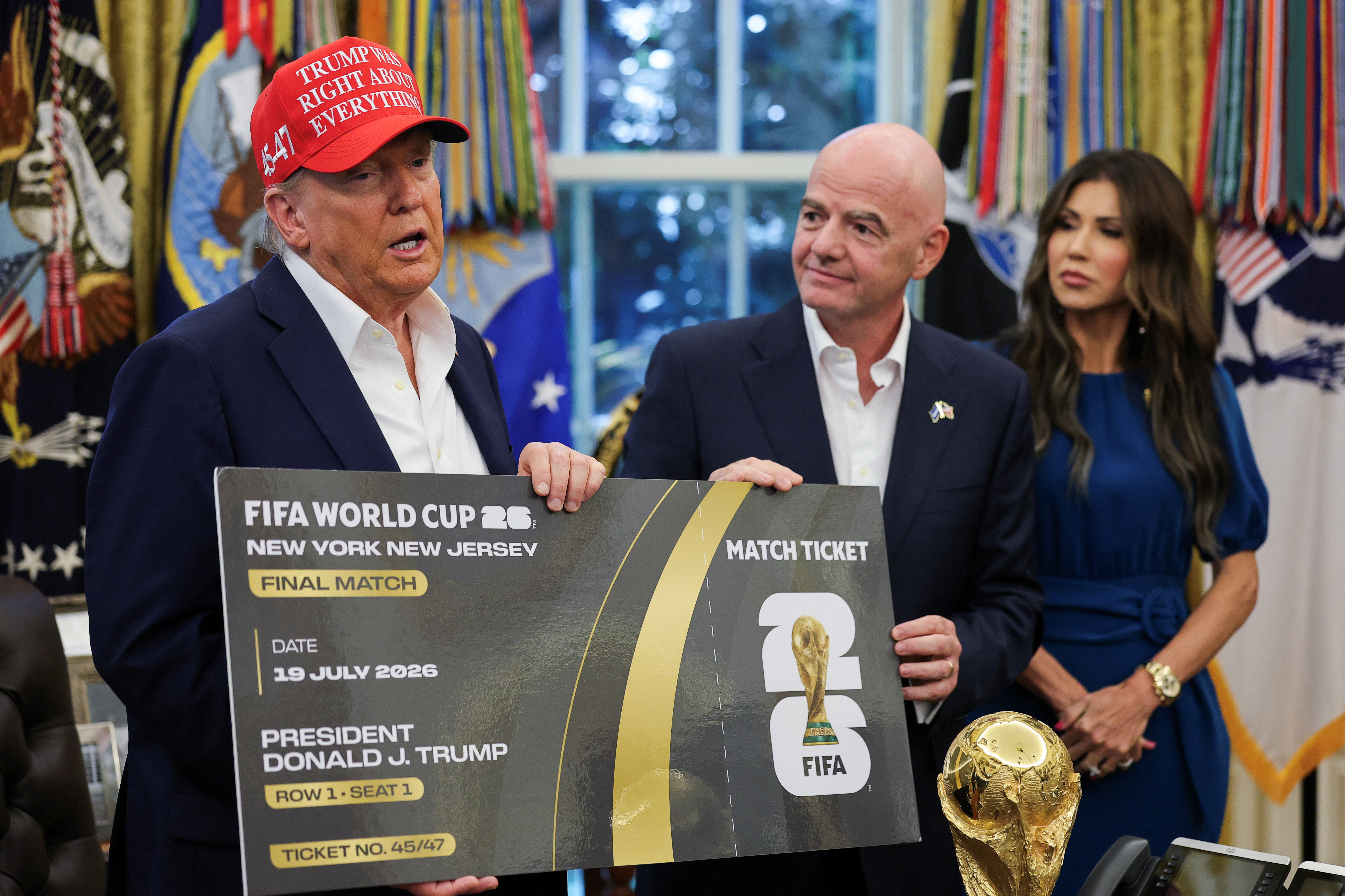 FIFA chief Gianni Infantino presents a 2026 FIFA World Cup final match ticket to US President Donald Trump
